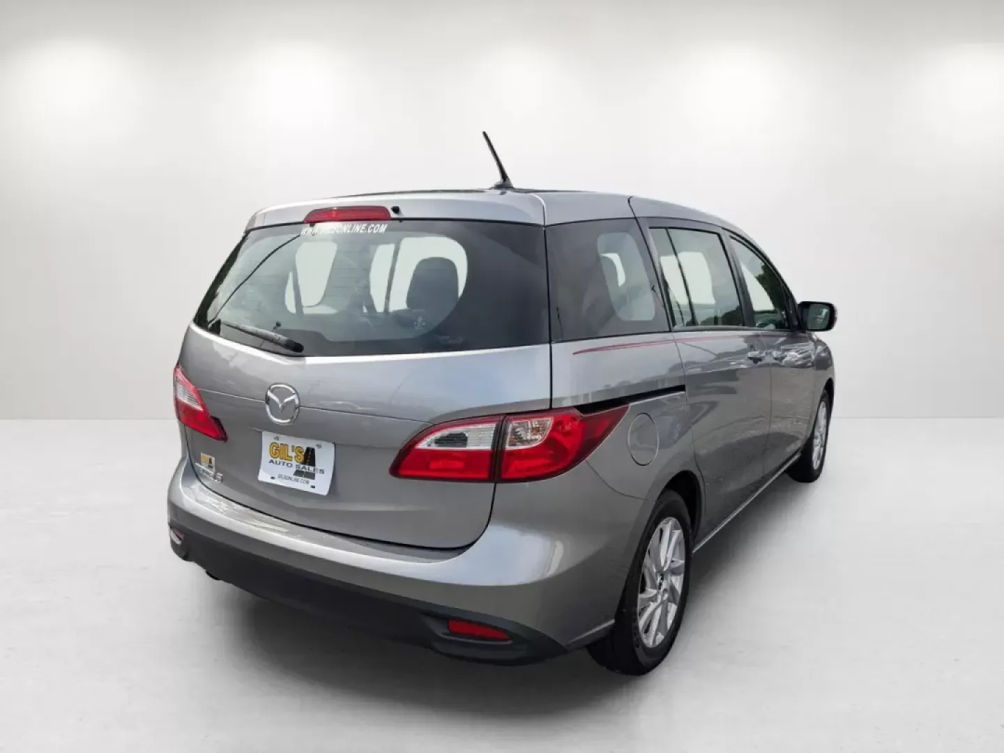 2014 /Black Mazda Mazda5 Sport (JM1CW2BL8E0) with an Other engine, located at 804 22nd Ave, Phenix City, AL, 36870, (334) 297-1860, 32.484749, -85.024475 - **Experience Versatility with the 2014 Mazda5 Sport at Gils Auto - Columbus #2!**<br /> <br /> Are you ready to elevate your lifestyle with a vehicle that adapts to your family's needs, weekend adventures, and daily commutes? Look no further! The 2014 Mazda5 Sport is your perfect companion for life - Photo#4