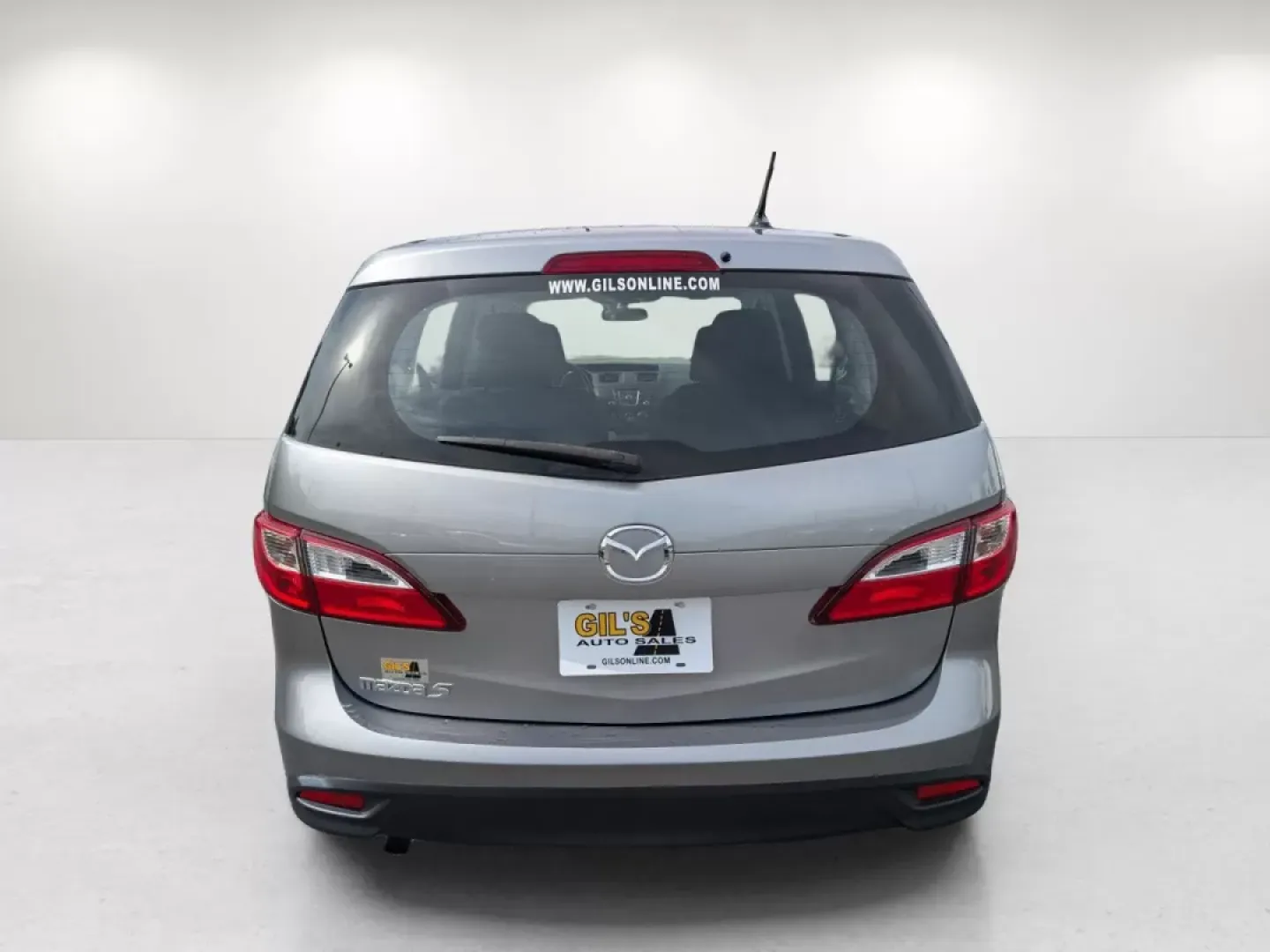 2014 /Black Mazda Mazda5 Sport (JM1CW2BL8E0) with an Other engine, located at 804 22nd Ave, Phenix City, AL, 36870, (334) 297-1860, 32.484749, -85.024475 - **Experience Versatility with the 2014 Mazda5 Sport at Gils Auto - Columbus #2!**<br /> <br /> Are you ready to elevate your lifestyle with a vehicle that adapts to your family's needs, weekend adventures, and daily commutes? Look no further! The 2014 Mazda5 Sport is your perfect companion for life - Photo#5