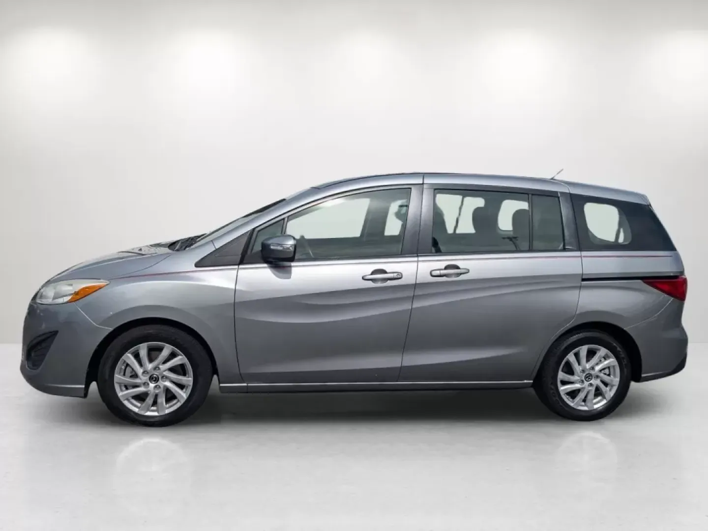 2014 /Black Mazda Mazda5 Sport (JM1CW2BL8E0) with an Other engine, located at 804 22nd Ave, Phenix City, AL, 36870, (334) 297-1860, 32.484749, -85.024475 - **Experience Versatility with the 2014 Mazda5 Sport at Gils Auto - Columbus #2!**<br /> <br /> Are you ready to elevate your lifestyle with a vehicle that adapts to your family's needs, weekend adventures, and daily commutes? Look no further! The 2014 Mazda5 Sport is your perfect companion for life - Photo#7