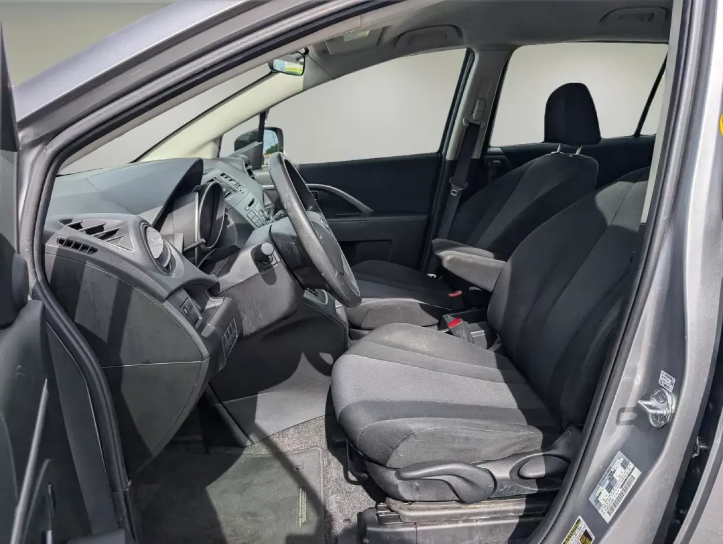 2014 /Black Mazda Mazda5 Sport (JM1CW2BL8E0) with an Other engine, located at 804 22nd Ave, Phenix City, AL, 36870, (334) 297-1860, 32.484749, -85.024475 - **Experience Versatility with the 2014 Mazda5 Sport at Gils Auto - Columbus #2!**<br /> <br /> Are you ready to elevate your lifestyle with a vehicle that adapts to your family's needs, weekend adventures, and daily commutes? Look no further! The 2014 Mazda5 Sport is your perfect companion for life - Photo#9