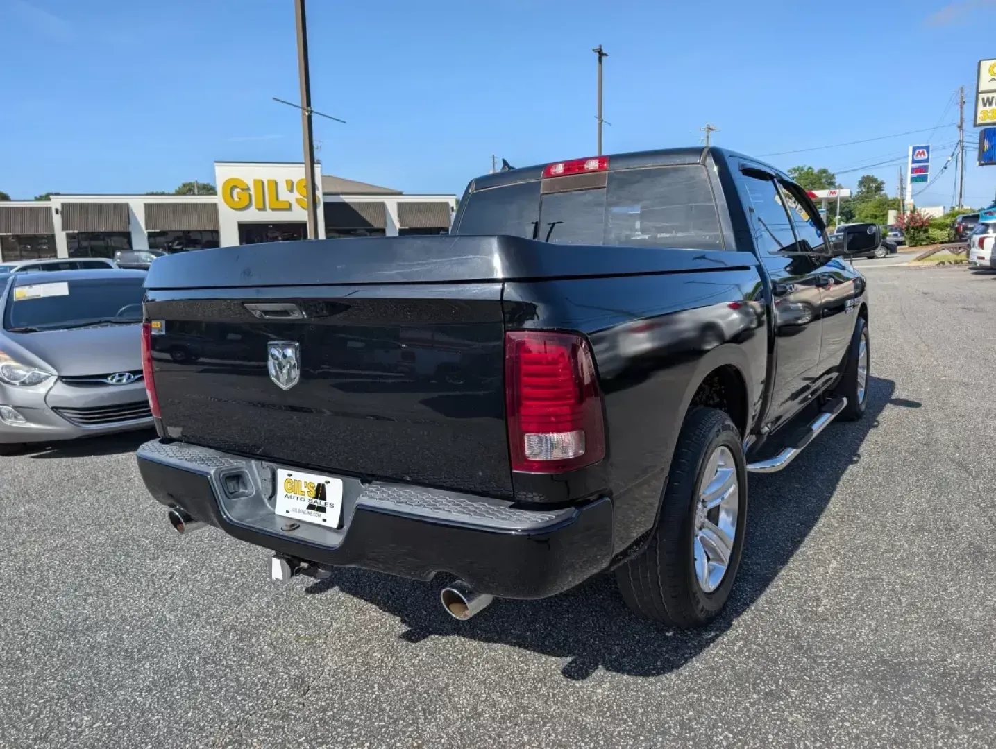 2014 /Black Ram 1500 Sport (1C6RR6MTXES) with an Regular Unleaded V-8 5.7 L/345 engine, 8-Speed Automatic w/OD transmission, located at 3959 U.S. 80 W, Phenix City, AL, 36870, (334) 297-4885, 32.469296, -85.135185 - 2014 Ram 1500 Sport - Photo#4