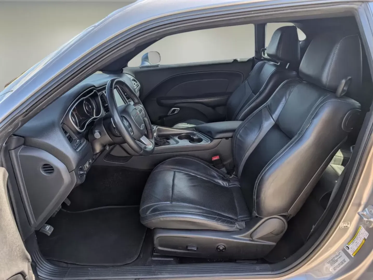 2015 /Black Dodge Challenger SXT Plus (2C3CDZBG5FH) with an Other engine, located at 804 22nd Ave, Phenix City, AL, 36870, (334) 297-1860, 32.484749, -85.024475 - Elevate your driving experience with the thrilling 2015 Dodge Challenger SXT Plus, now available at Gils Auto in Phenix City, AL. This coupe is not just a vehicle; it's a lifestyle choice for those who crave performance, style, and the freedom of the open road. Whether you're taking the family for a - Photo#9
