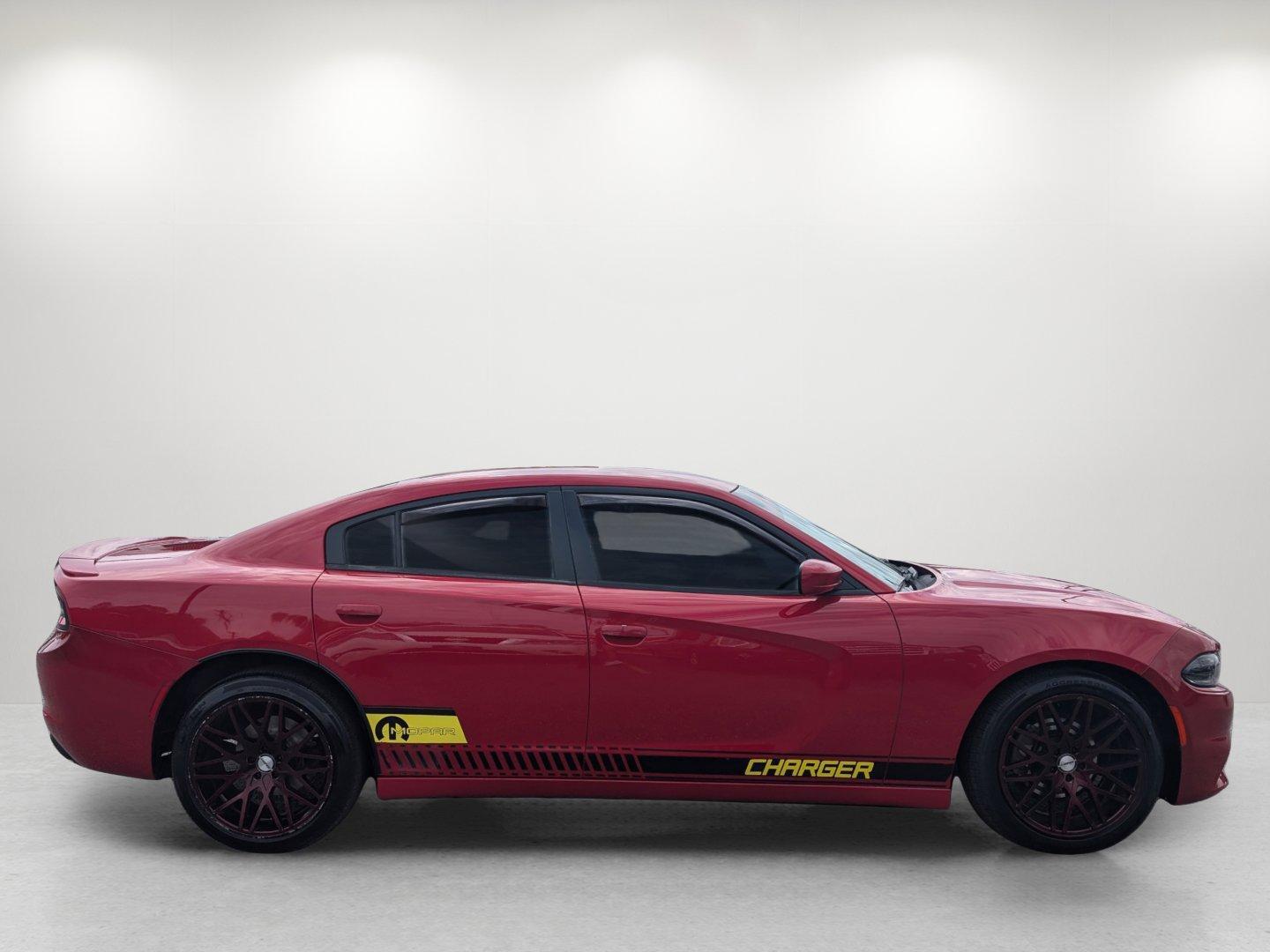 2015 /Black Dodge Charger SE (2C3CDXBGXFH) with an Regular Unleaded V-6 3.6 L/220 engine, 8-Speed Automatic w/OD transmission, located at 1430 Gateway Drive, Opelika, AL, 36801, (334) 239-0944, 32.637871, -85.409790 - 2015 Dodge Charger SE - Photo#3