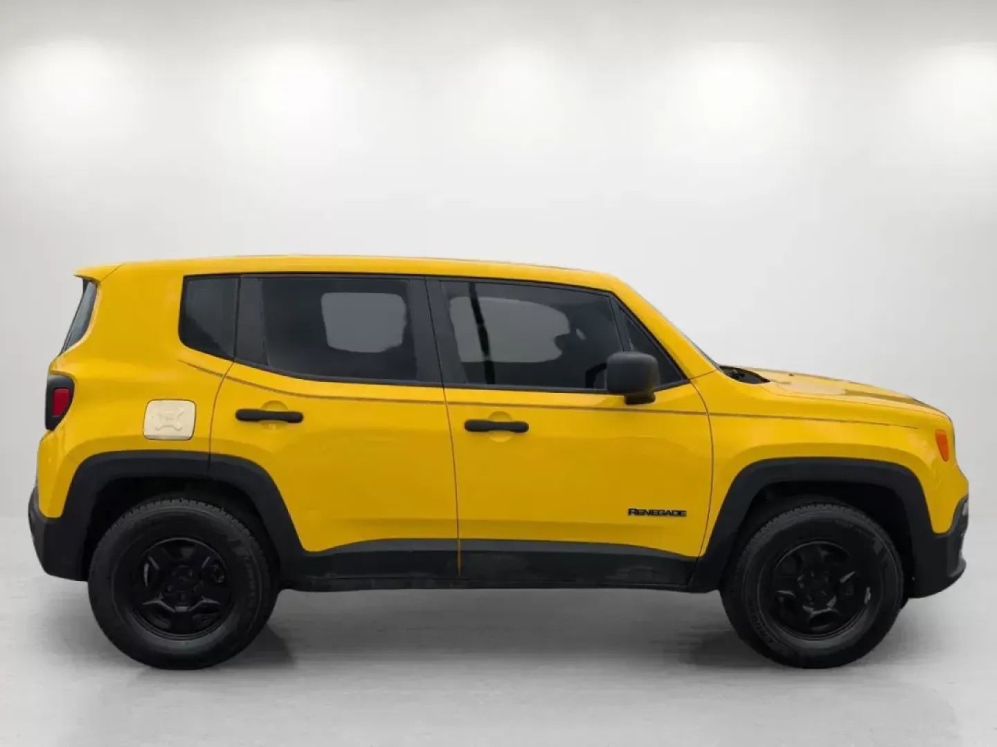 2015 /Black Jeep Renegade Sport (ZACCJBAT1FP) with an Other engine, located at 1430 Gateway Drive, Opelika, AL, 36801, (334) 239-0944, 32.637871, -85.409790 - ### Unleash Adventure with This 2015 Jeep Renegade Sport in Opelika!<br /> <br /> Are you ready to elevate your weekend adventures or daily commutes? This 2015 Jeep Renegade Sport, now available at Gils Auto in Opelika, AL, is your ticket to both thrill and utility! With its striking Solar Yellow ex - Photo#4