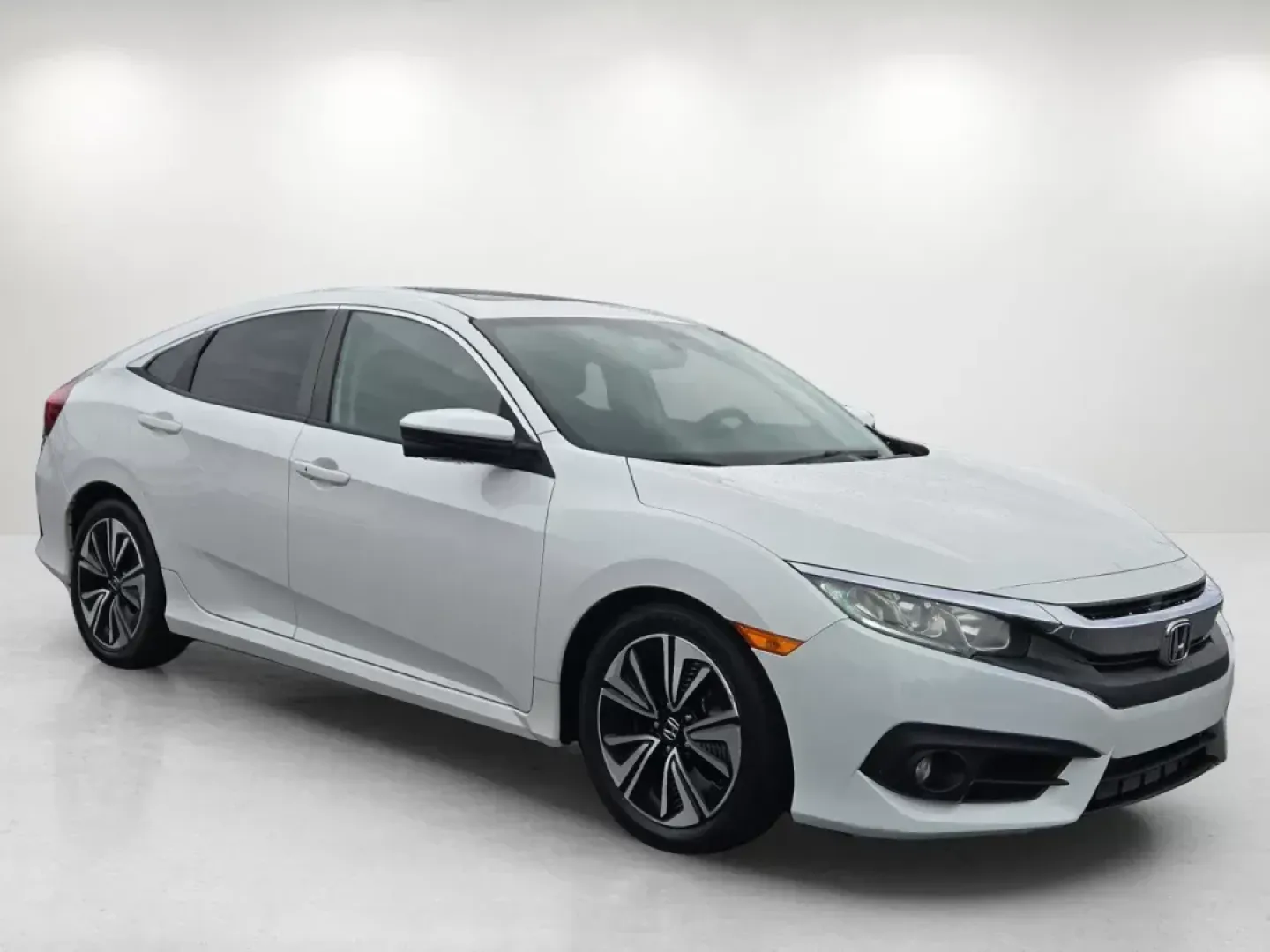 2016 Honda Civic Sedan EX-T (19XFC1F38GE) with an Other engine, located at 1430 Gateway Drive, Opelika, AL, 36801, (334) 239-0944, 32.637871, -85.409790 - **Unleash Your Driving Potential with the 2016 Honda Civic Sedan at Gils Auto!**<br /> <br /> Are you ready to elevate your daily commute and family outings to a whole new level? The 2016 Honda Civic Sedan EX-T is the perfect blend of reliability, style, and advanced features, making it an ideal cho - Photo#2