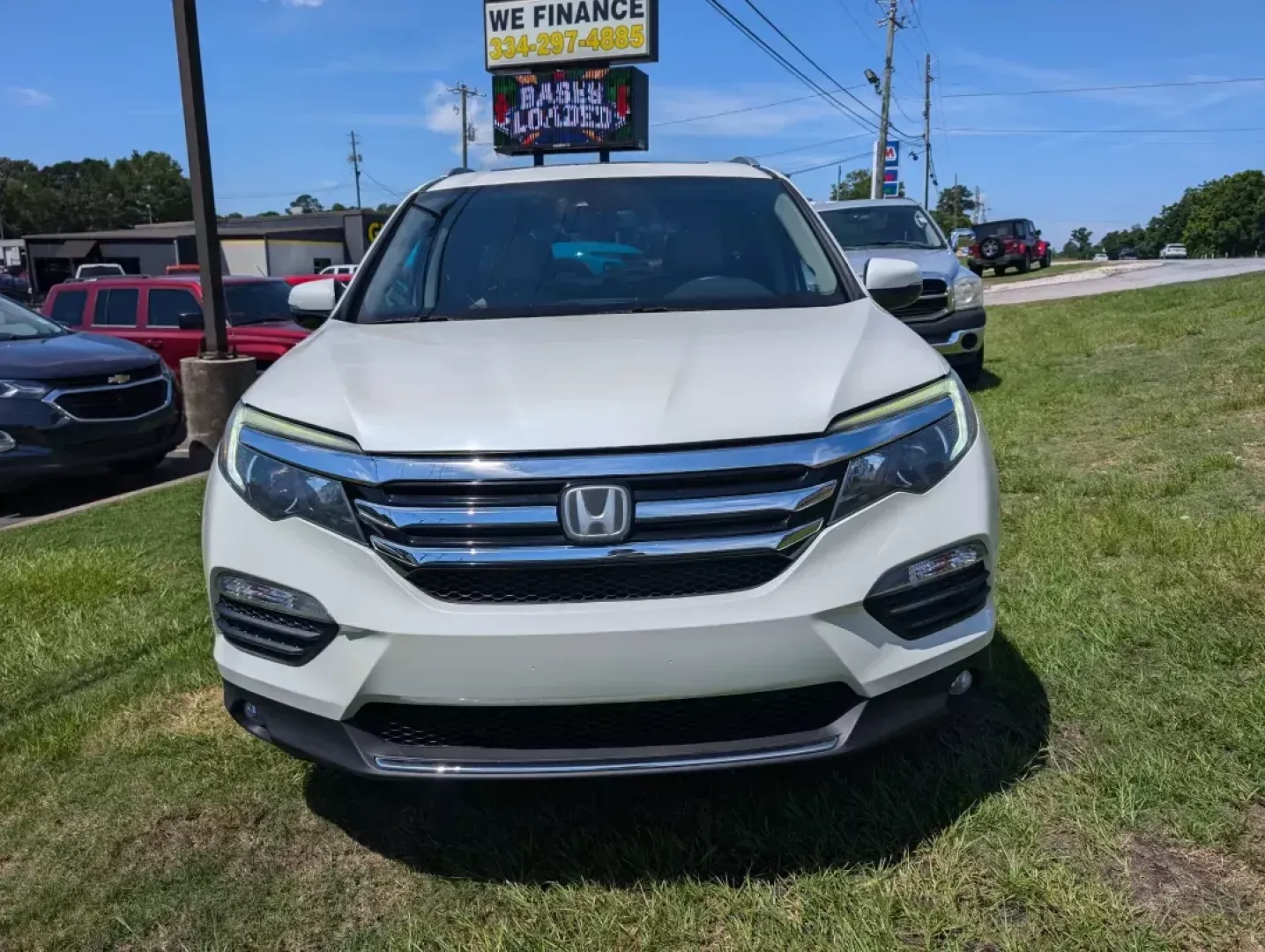 2016 Honda Pilot Elite (5FNYF6H07GB) with an Other engine, located at 3959 U.S. 80 W, Phenix City, AL, 36870, (334) 297-4885, 32.469296, -85.135185 - **Adventure Awaits with the 2016 Honda Pilot Elite - Perfect for Family Road Trips!**<br /> <br /> If you're searching for a reliable vehicle that combines comfort, style, and capability, look no further than the 2016 Honda Pilot Elite. This versatile SUV is designed for growing families and weekend - Photo#1
