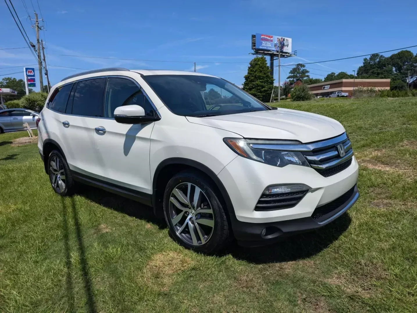 2016 Honda Pilot Elite (5FNYF6H07GB) with an Other engine, located at 3959 U.S. 80 W, Phenix City, AL, 36870, (334) 297-4885, 32.469296, -85.135185 - **Adventure Awaits with the 2016 Honda Pilot Elite - Perfect for Family Road Trips!**<br /> <br /> If you're searching for a reliable vehicle that combines comfort, style, and capability, look no further than the 2016 Honda Pilot Elite. This versatile SUV is designed for growing families and weekend - Photo#2