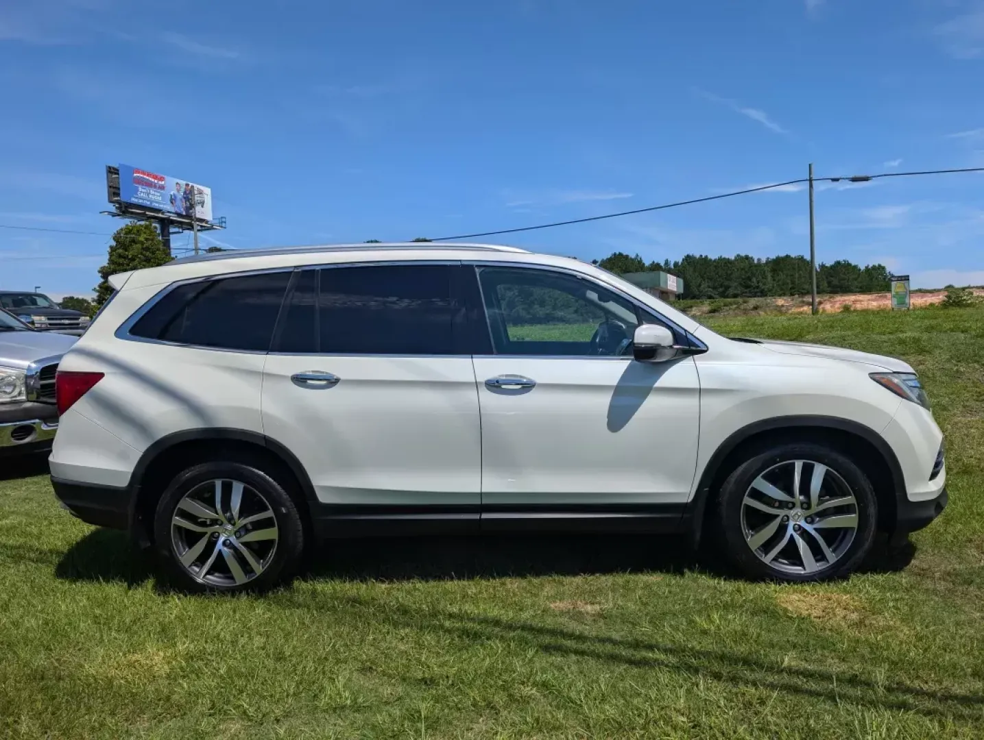 2016 Honda Pilot Elite (5FNYF6H07GB) with an Other engine, located at 3959 U.S. 80 W, Phenix City, AL, 36870, (334) 297-4885, 32.469296, -85.135185 - **Adventure Awaits with the 2016 Honda Pilot Elite - Perfect for Family Road Trips!**<br /> <br /> If you're searching for a reliable vehicle that combines comfort, style, and capability, look no further than the 2016 Honda Pilot Elite. This versatile SUV is designed for growing families and weekend - Photo#3