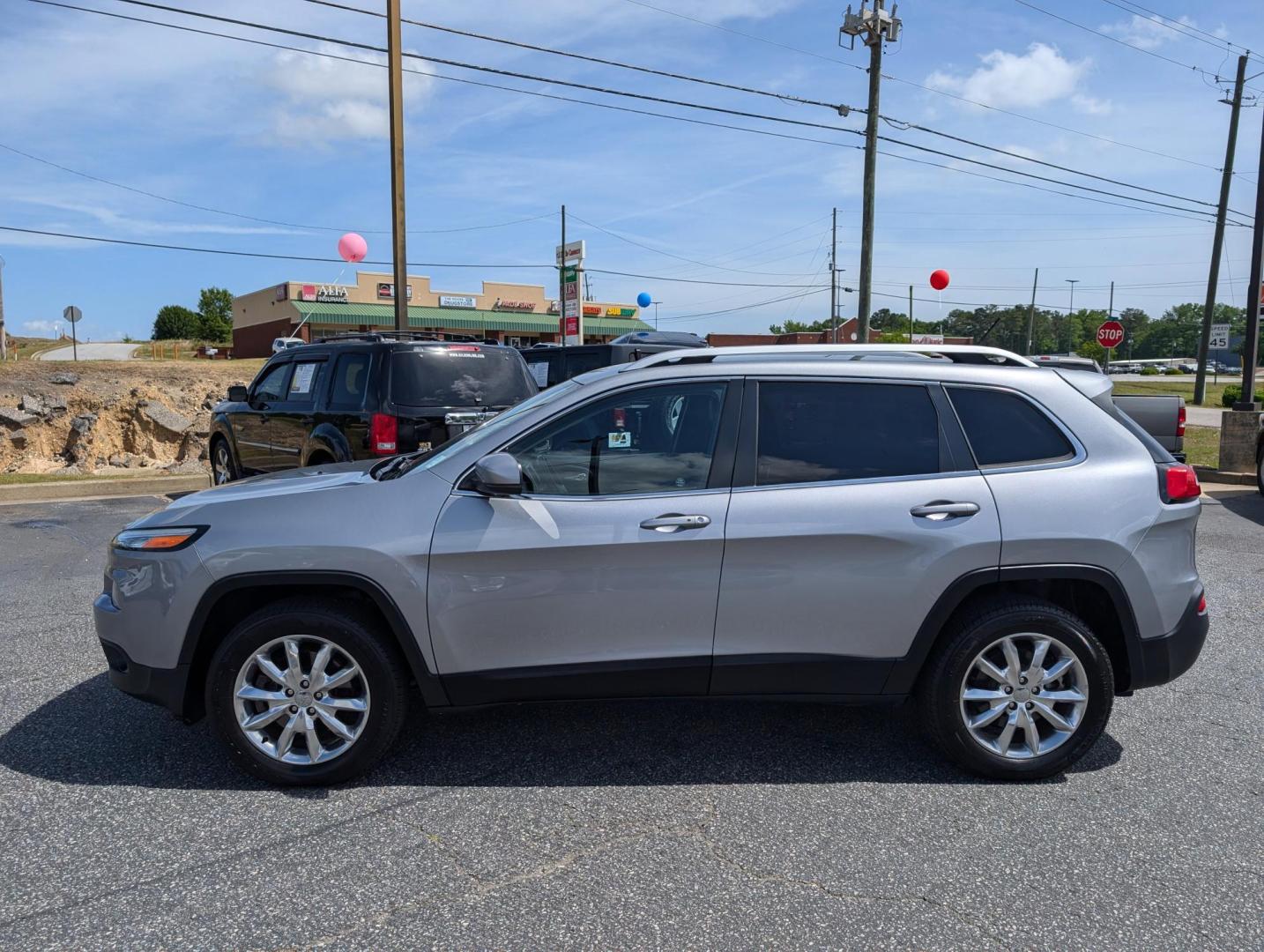 2016 /Black Jeep Cherokee Limited (1C4PJMDB8GW) with an Regular Unleaded I-4 2.4 L/144 engine, 9-Speed Automatic w/OD transmission, located at 3959 U.S. 80 W, Phenix City, AL, 36870, (334) 297-4885, 32.469296, -85.135185 - 2016 Jeep Cherokee Limited - Photo#7
