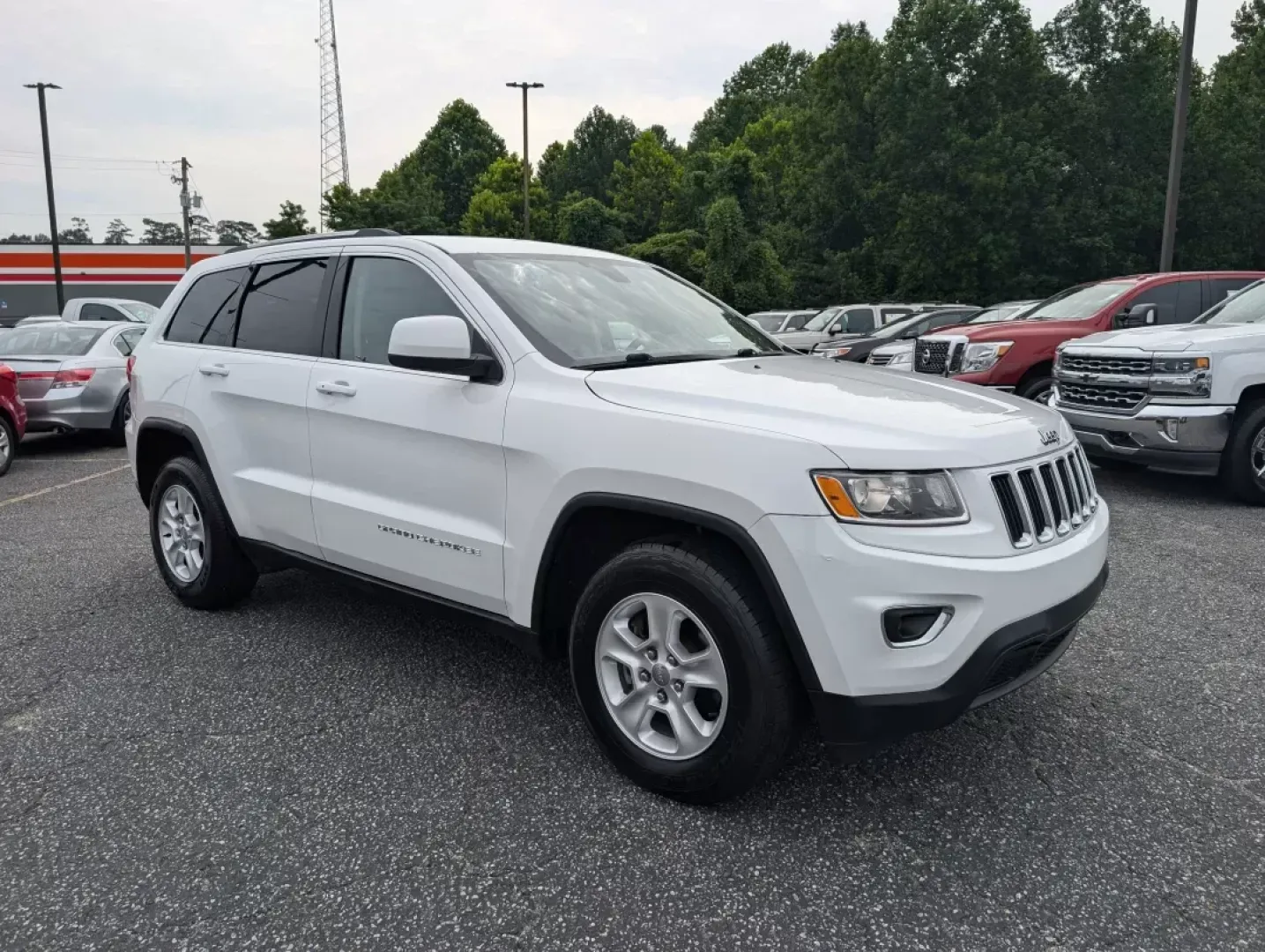 2016 /Lt Frost Beige/Black Jeep Grand Cherokee Laredo (1C4RJEAG8GC) with an Other engine, located at 7000 Northlake Connector, Columbus, GA, 31904, (706) 987-8085, 32.524975, -84.978134 - Discover the perfect blend of adventure and everyday practicality with the 2016 Jeep Grand Cherokee Laredo, now available at Gils Auto in Phenix City, AL! This remarkable SUV is designed for those seeking versatility, whether you're tackling the daily commute, planning a weekend getaway, or navigati - Photo#2