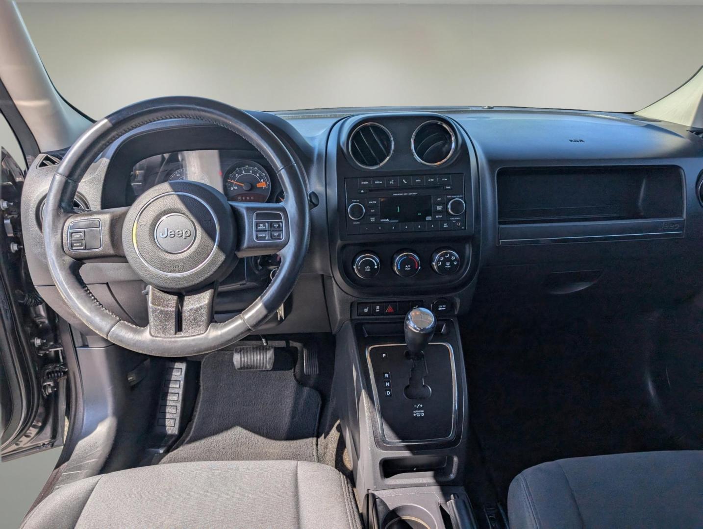 2016 /Dark Slate Gray Jeep Patriot Latitude (1C4NJPFA9GD) with an Regular Unleaded I-4 2.0 L/122 engine, 1-Speed CVT w/OD transmission, located at 1430 Gateway Drive, Opelika, AL, 36801, (334) 239-0944, 32.637871, -85.409790 - 2016 Jeep Patriot Latitude - Photo#11