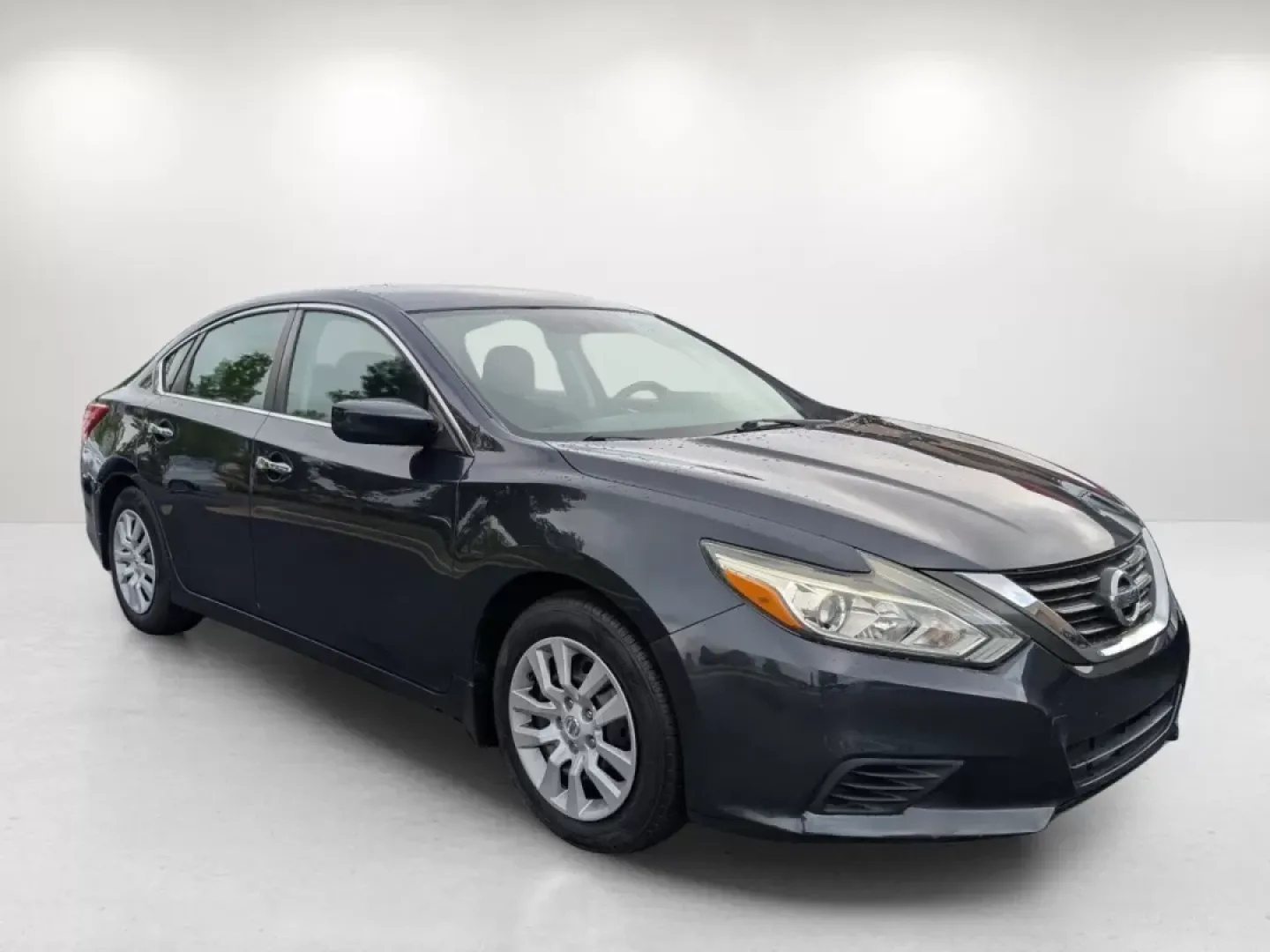 2016 /Charcoal Nissan Altima 2.5 S (1N4AL3AP4GC) with an Other engine, located at 7000 Northlake Connector, Columbus, GA, 31904, (706) 987-8085, 32.524975, -84.978134 - **Discover Your Next Adventure with the 2016 Nissan Altima at Gils Auto - Phenix City!**<br /> <br /> Are you a growing family looking for a reliable sedan that can handle daily commutes while providing comfort and style? Or perhaps you're a budget-conscious buyer searching for a vehicle with guaran - Photo#3