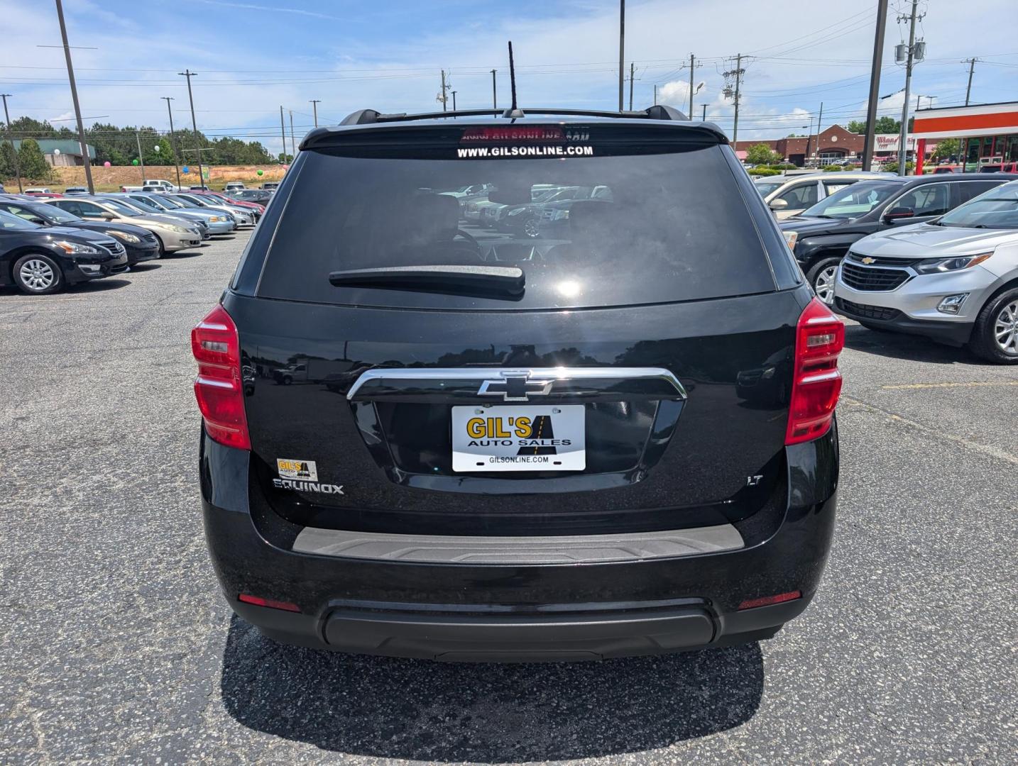 2017 /Jet Black Chevrolet Equinox LT (2GNALCEK0H6) with an Gas I4 2.4/145 engine, 6-Speed Automatic transmission, located at 3959 U.S. 80 W, Phenix City, AL, 36870, (334) 297-4885, 32.469296, -85.135185 - 2017 Chevrolet Equinox LT - Photo#5