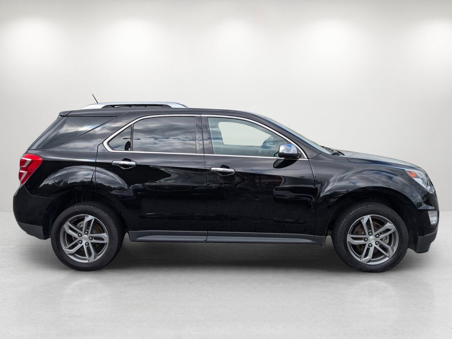 2017 /Jet Black Chevrolet Equinox Premier (2GNALDEK6H1) with an Gas I4 2.4/145 engine, 6-Speed Automatic transmission, located at 804 22nd Ave, Phenix City, AL, 36870, (334) 297-1860, 32.484749, -85.024475 - 2017 Chevrolet Equinox Premier - Photo#3