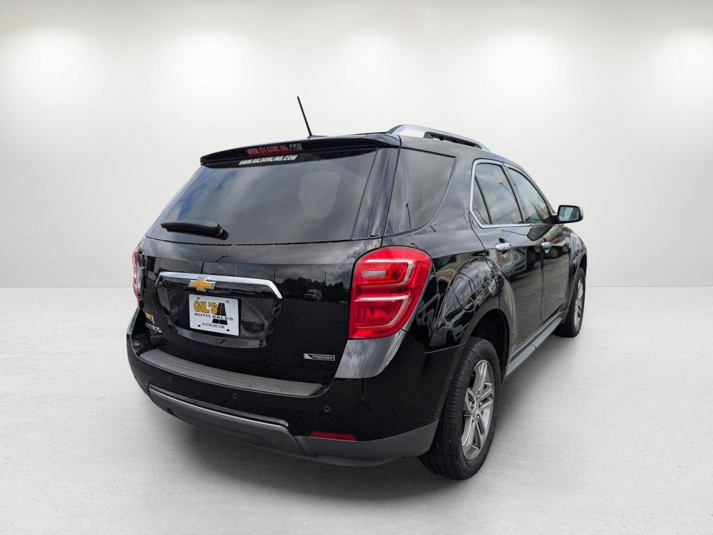 2017 /Jet Black Chevrolet Equinox Premier (2GNALDEK6H1) with an Gas I4 2.4/145 engine, 6-Speed Automatic transmission, located at 804 22nd Ave, Phenix City, AL, 36870, (334) 297-1860, 32.484749, -85.024475 - 2017 Chevrolet Equinox Premier - Photo#4
