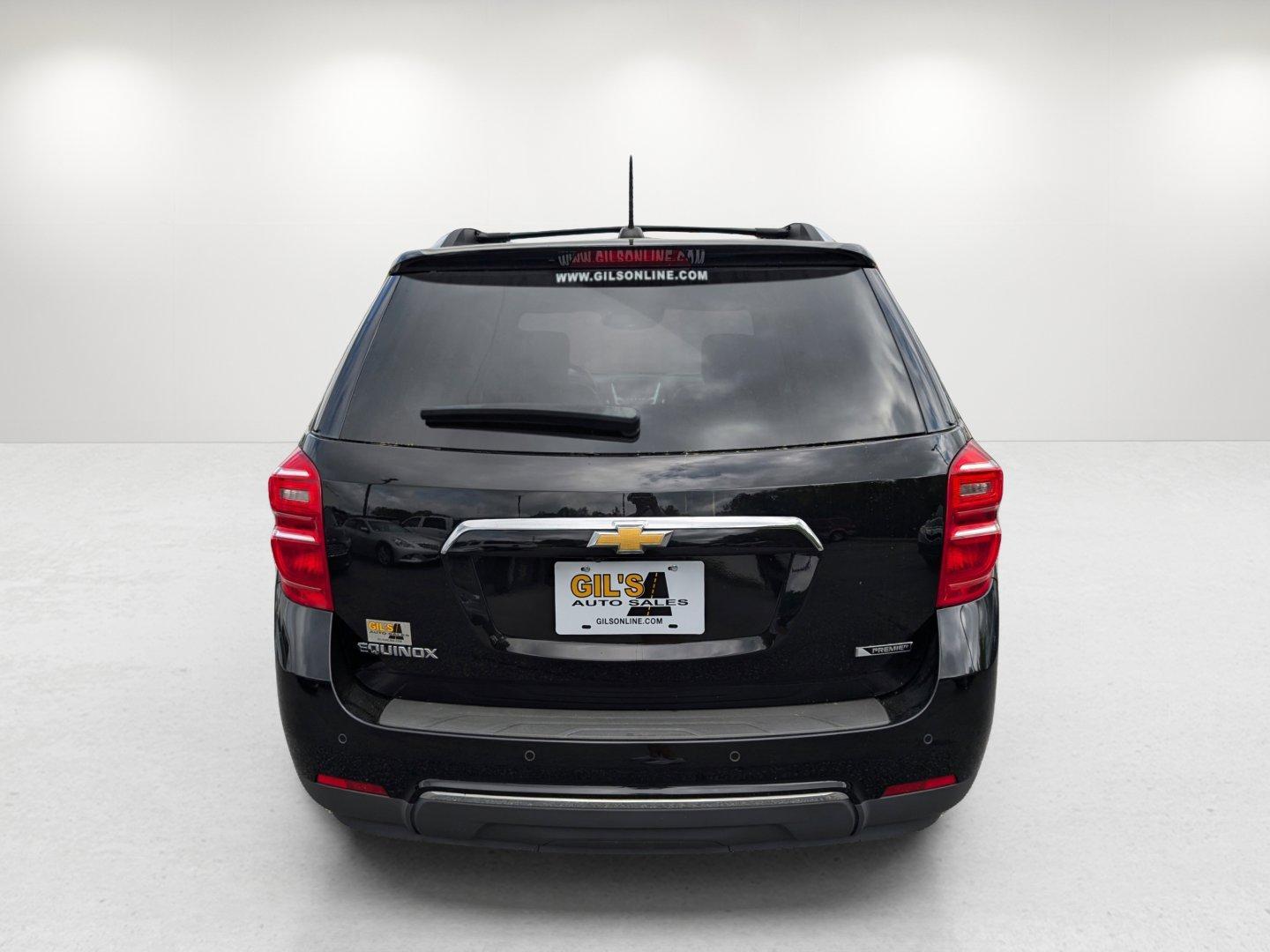 2017 /Jet Black Chevrolet Equinox Premier (2GNALDEK6H1) with an Gas I4 2.4/145 engine, 6-Speed Automatic transmission, located at 804 22nd Ave, Phenix City, AL, 36870, (334) 297-1860, 32.484749, -85.024475 - 2017 Chevrolet Equinox Premier - Photo#5