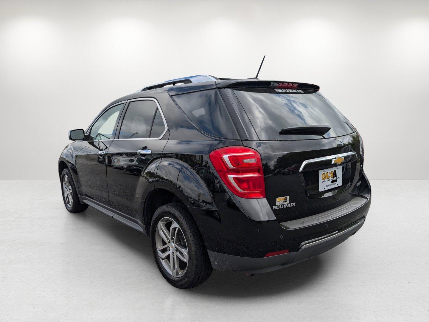 2017 /Jet Black Chevrolet Equinox Premier (2GNALDEK6H1) with an Gas I4 2.4/145 engine, 6-Speed Automatic transmission, located at 804 22nd Ave, Phenix City, AL, 36870, (334) 297-1860, 32.484749, -85.024475 - 2017 Chevrolet Equinox Premier - Photo#6