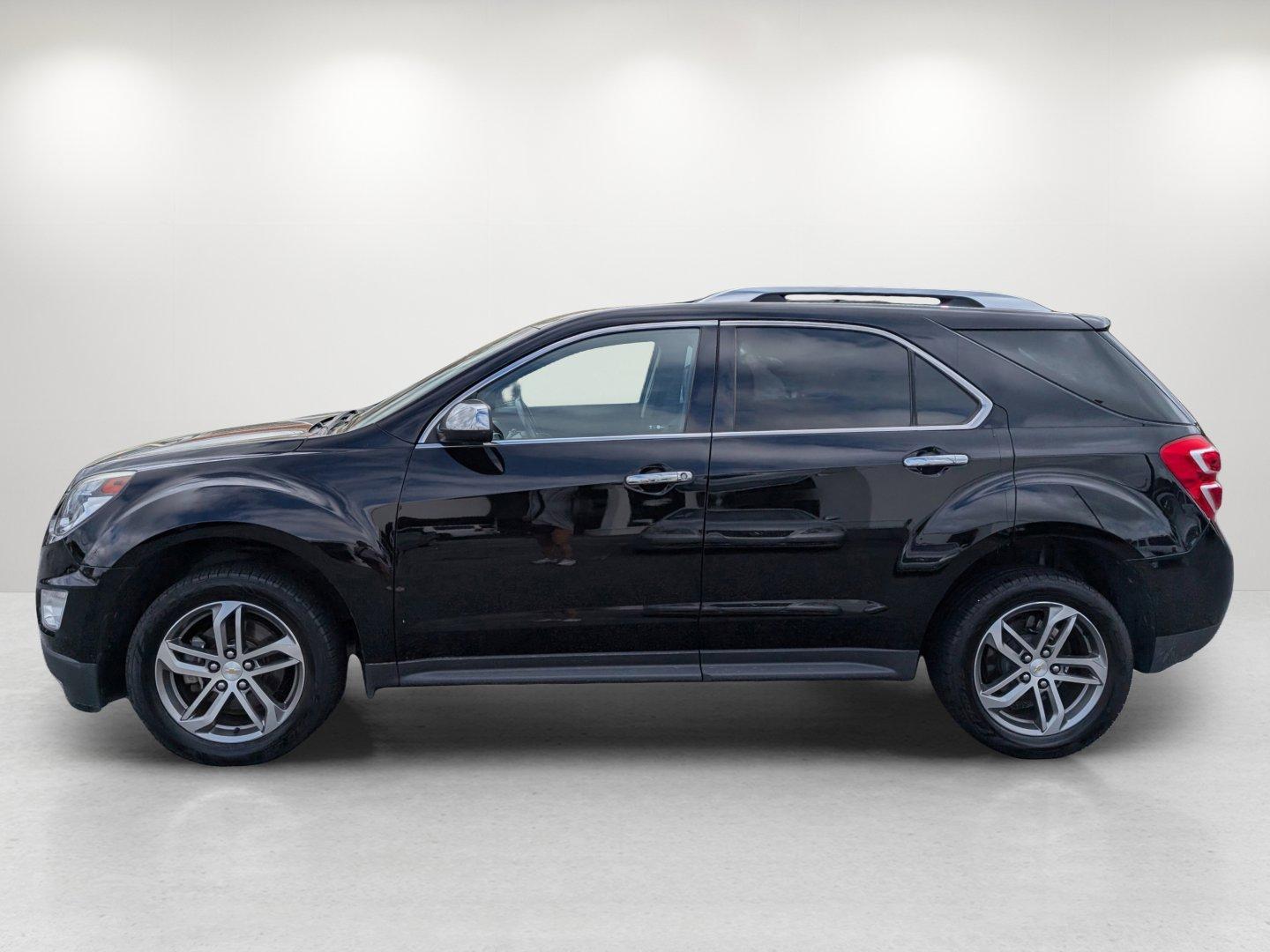 2017 /Jet Black Chevrolet Equinox Premier (2GNALDEK6H1) with an Gas I4 2.4/145 engine, 6-Speed Automatic transmission, located at 804 22nd Ave, Phenix City, AL, 36870, (334) 297-1860, 32.484749, -85.024475 - 2017 Chevrolet Equinox Premier - Photo#7