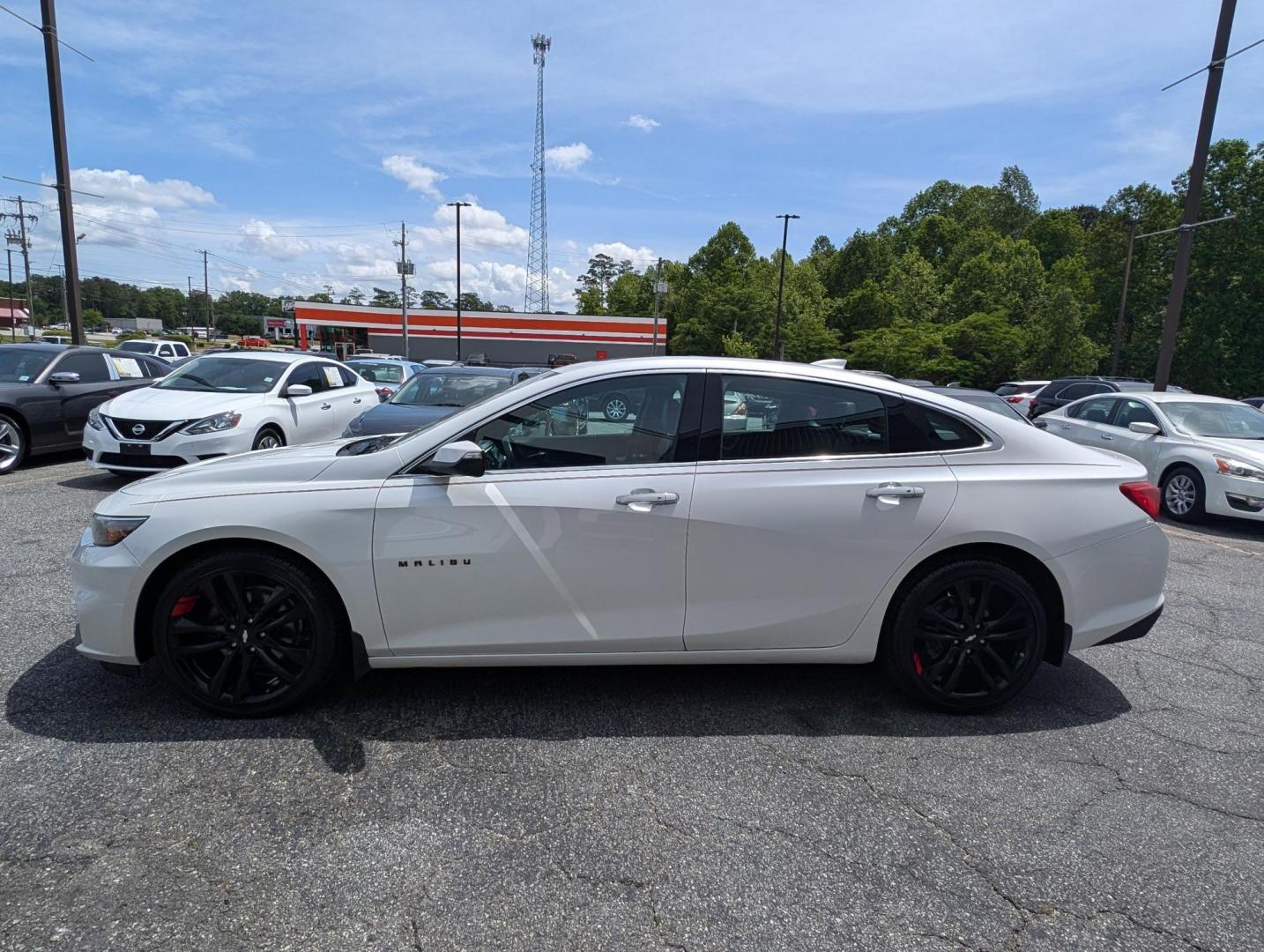 2017 /Jet Black Chevrolet Malibu Premier (1G1ZH5SX9HF) with an Turbocharged Gas I4 2.0L/122 engine, 9-Speed Automatic transmission, located at 3959 U.S. 80 W, Phenix City, AL, 36870, (334) 297-4885, 32.469296, -85.135185 - 2017 Chevrolet Malibu Premier - Photo#7