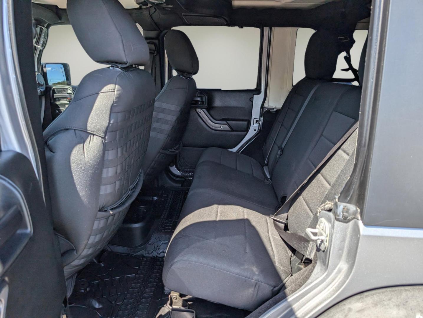 2017 /Black Jeep Wrangler Unlimited Willys Wheeler (1C4BJWDG1HL) with an Regular Unleaded V-6 3.6 L/220 engine, 5-Speed Automatic w/OD transmission, located at 1430 Gateway Drive, Opelika, AL, 36801, (334) 239-0944, 32.637871, -85.409790 - 2017 Jeep Wrangler Unlimited Willys Wheeler - Photo#10
