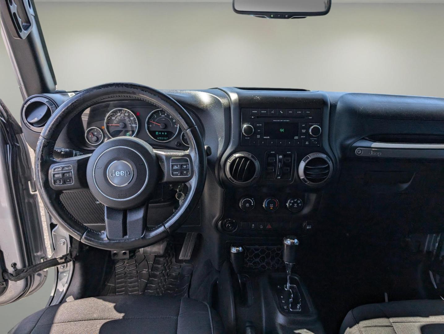 2017 /Black Jeep Wrangler Unlimited Willys Wheeler (1C4BJWDG1HL) with an Regular Unleaded V-6 3.6 L/220 engine, 5-Speed Automatic w/OD transmission, located at 1430 Gateway Drive, Opelika, AL, 36801, (334) 239-0944, 32.637871, -85.409790 - 2017 Jeep Wrangler Unlimited Willys Wheeler - Photo#11