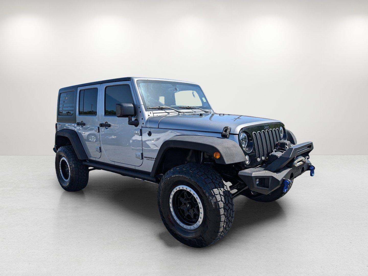 2017 /Black Jeep Wrangler Unlimited Willys Wheeler (1C4BJWDG1HL) with an Regular Unleaded V-6 3.6 L/220 engine, 5-Speed Automatic w/OD transmission, located at 1430 Gateway Drive, Opelika, AL, 36801, (334) 239-0944, 32.637871, -85.409790 - 2017 Jeep Wrangler Unlimited Willys Wheeler - Photo#2