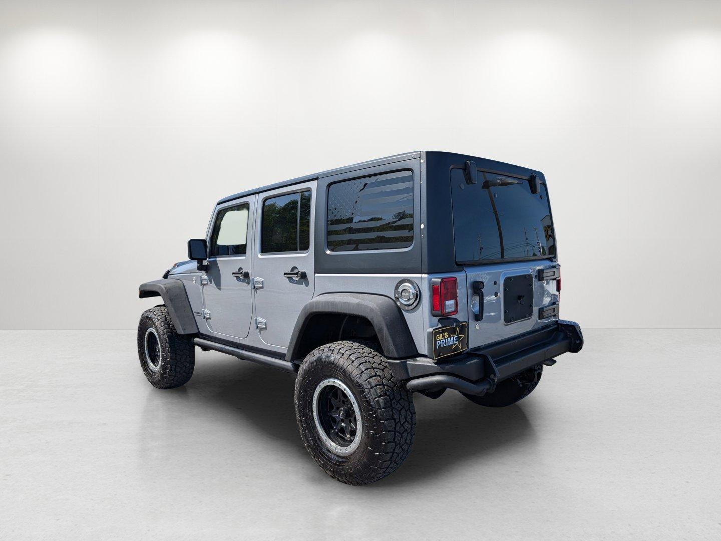 2017 /Black Jeep Wrangler Unlimited Willys Wheeler (1C4BJWDG1HL) with an Regular Unleaded V-6 3.6 L/220 engine, 5-Speed Automatic w/OD transmission, located at 1430 Gateway Drive, Opelika, AL, 36801, (334) 239-0944, 32.637871, -85.409790 - 2017 Jeep Wrangler Unlimited Willys Wheeler - Photo#6
