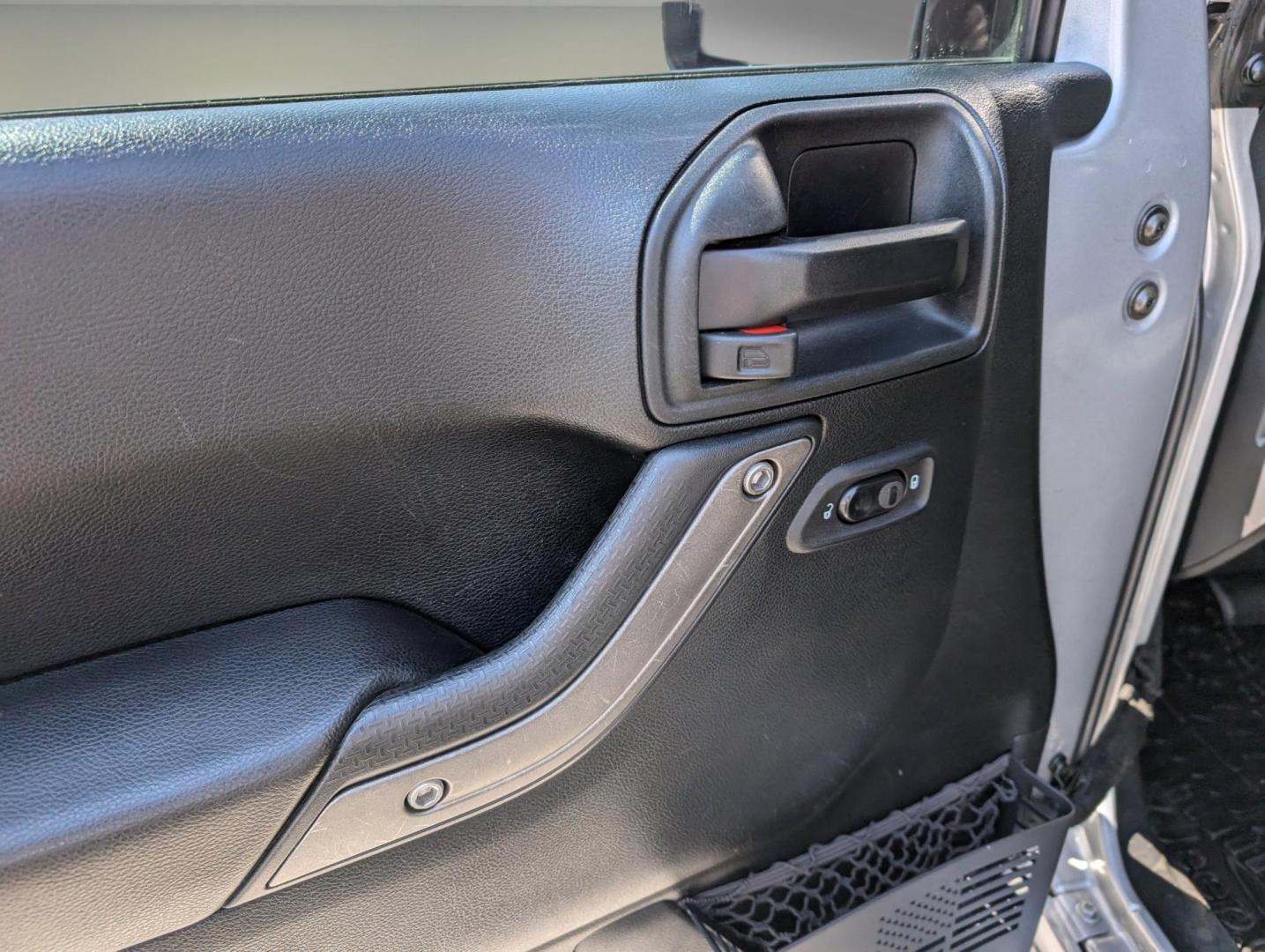 2017 /Black Jeep Wrangler Unlimited Willys Wheeler (1C4BJWDG1HL) with an Regular Unleaded V-6 3.6 L/220 engine, 5-Speed Automatic w/OD transmission, located at 1430 Gateway Drive, Opelika, AL, 36801, (334) 239-0944, 32.637871, -85.409790 - 2017 Jeep Wrangler Unlimited Willys Wheeler - Photo#8