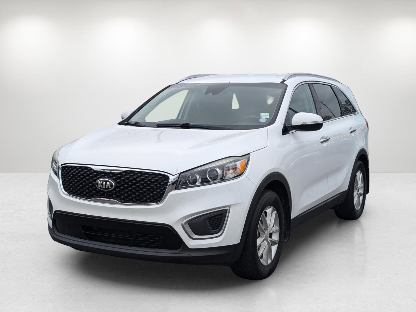 2017 /Satin Black Kia Sorento LX (5XYPG4A39HG) with an Regular Unleaded I-4 2.4 L/144 engine, 6-Speed Automatic w/OD transmission, located at 3959 U.S. 80 W, Phenix City, AL, 36870, (334) 297-4885, 32.469296, -85.135185 - 2017 Kia Sorento LX - Photo#1