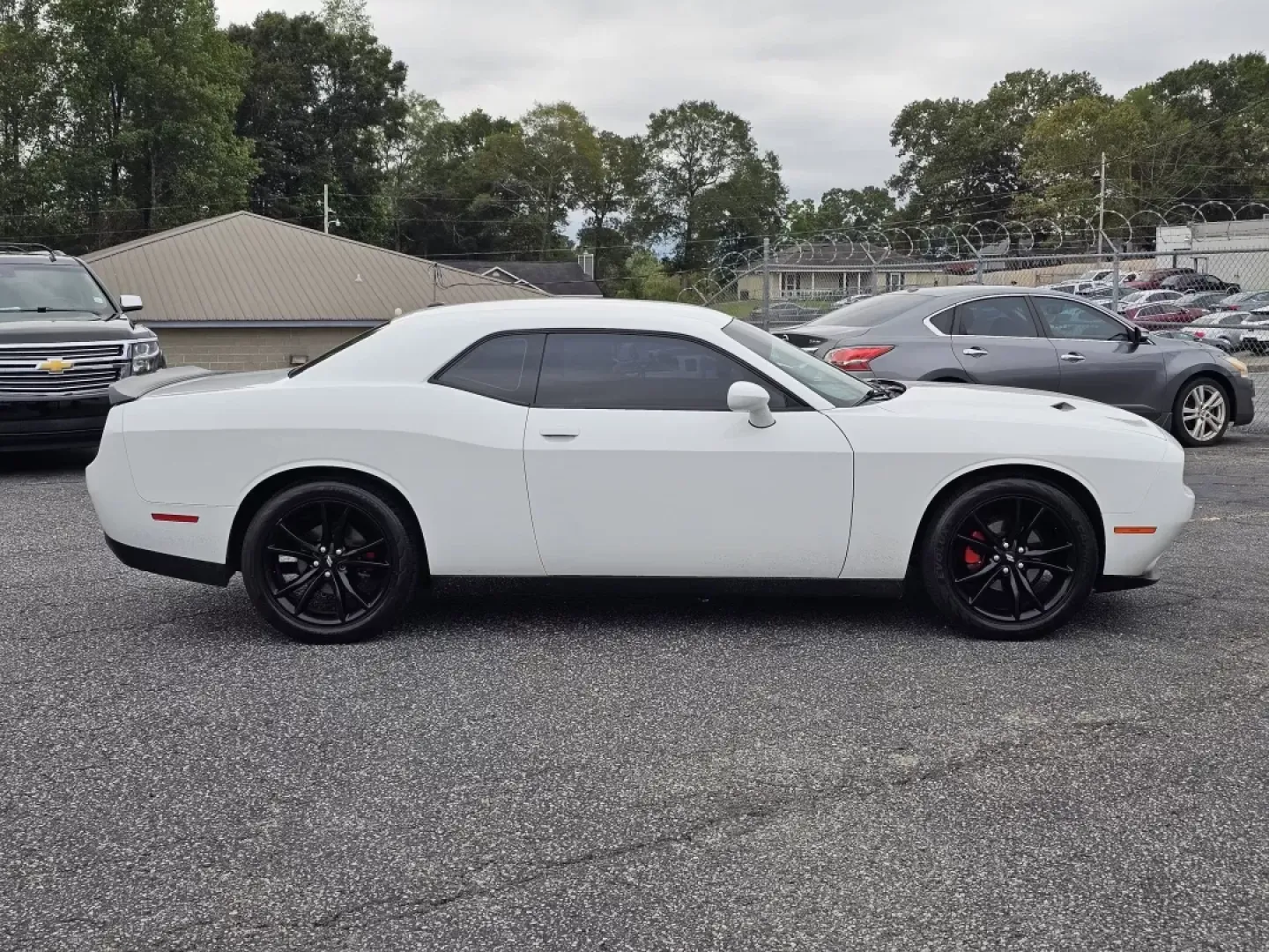 2018 /Black Dodge Challenger SXT (2C3CDZAG6JH) with an Other engine, located at 3959 U.S. 80 W, Phenix City, AL, 36870, (334) 297-4885, 32.469296, -85.135185 - **Unleash Your Inner Adventurer with the 2018 Dodge Challenger SXT at Gils Auto - Phenix City!**<br /> <br /> Are you ready to elevate your driving experience? Whether you're navigating your daily commute, cruising through the scenic roads of Alabama, or embarking on weekend adventures, the 2018 Dod - Photo#3
