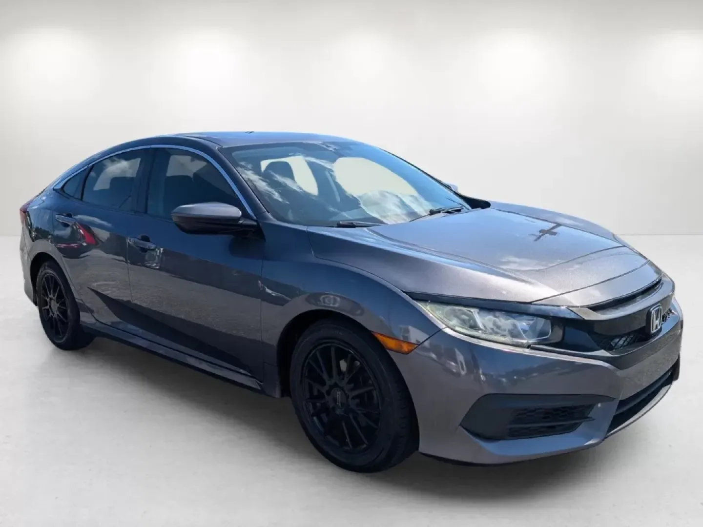 2018 Honda Civic Sedan LX (2HGFC2F50JH) with an Other engine, located at 804 22nd Ave, Phenix City, AL, 36870, (334) 297-1860, 32.484749, -85.024475 - **Discover Your Next Adventure with the 2018 Honda Civic Sedan at Gils Auto in Phenix City!**<br /> <br /> Are you seeking the perfect blend of efficiency, reliability, and style for your daily commute or weekend getaways? Look no further! The 2018 Honda Civic Sedan, available at Gils Auto Phenix C - Photo#2