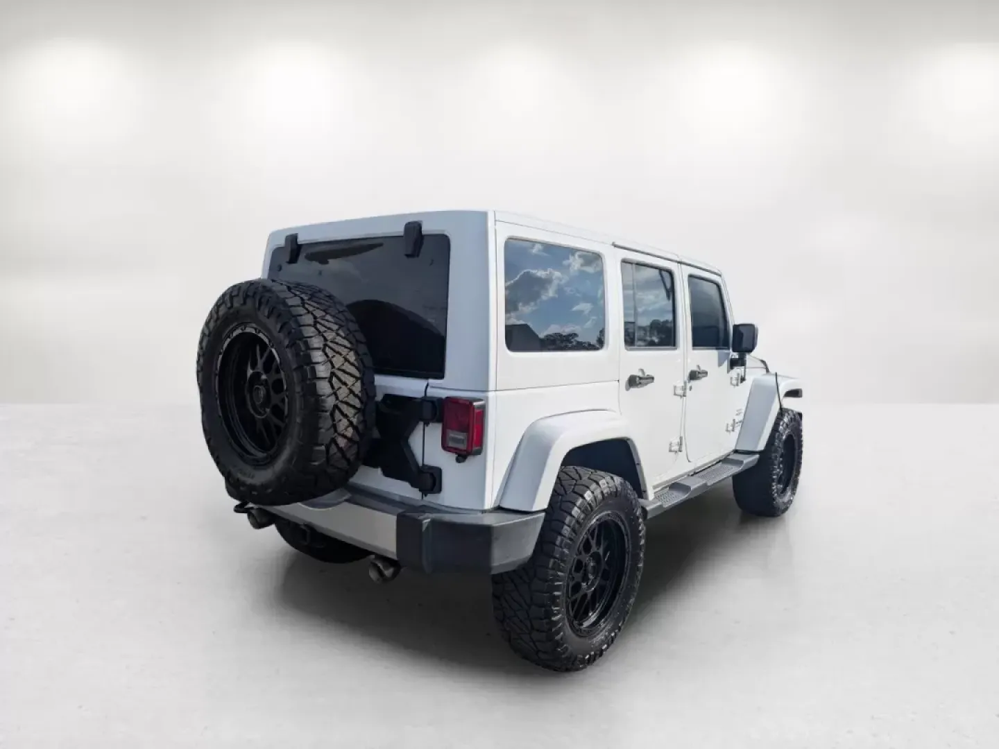 2018 /Black Jeep Wrangler Sahara (1C4BJWEG4JL) with an Other engine, located at 7000 Northlake Connector, Columbus, GA, 31904, (706) 987-8085, 32.524975, -84.978134 - **Adventure Awaits: 2018 Jeep Wrangler Sahara at Gils Auto**<br /> <br /> Are you ready to embark on your next adventure? Whether you're planning a weekend getaway to the stunning landscapes of Lake Martin or navigating through the vibrant streets of Phenix City, this 2018 Jeep Wrangler Sahara is yo - Photo#4