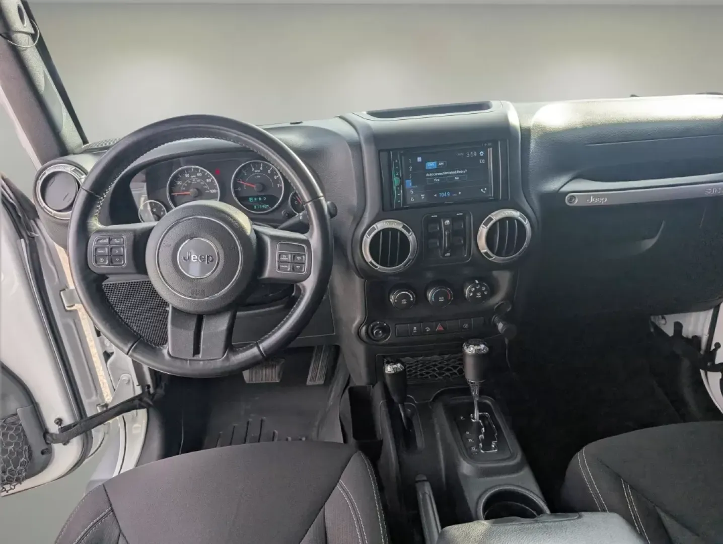 2018 /Black Jeep Wrangler Sahara (1C4BJWEG4JL) with an Other engine, located at 7000 Northlake Connector, Columbus, GA, 31904, (706) 987-8085, 32.524975, -84.978134 - **Adventure Awaits: 2018 Jeep Wrangler Sahara at Gils Auto**<br /> <br /> Are you ready to embark on your next adventure? Whether you're planning a weekend getaway to the stunning landscapes of Lake Martin or navigating through the vibrant streets of Phenix City, this 2018 Jeep Wrangler Sahara is yo - Photo#11