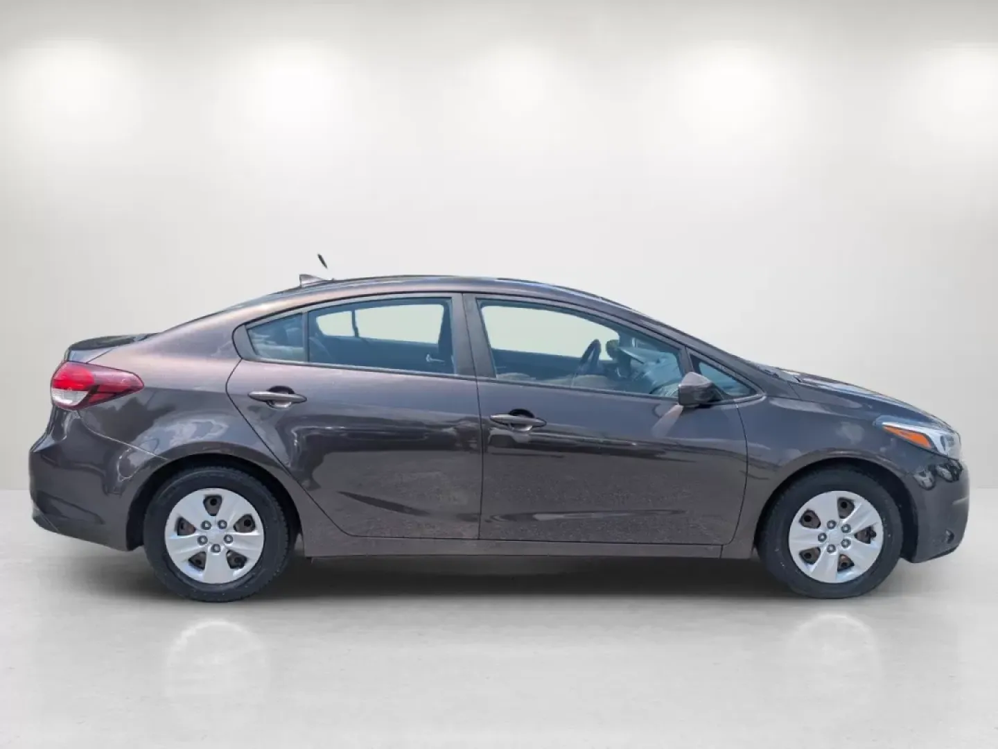 2018 /Black Kia Forte LX (3KPFK4A7XJE) with an Other engine, located at 804 22nd Ave, Phenix City, AL, 36870, (334) 297-1860, 32.484749, -85.024475 - Are you on the hunt for a reliable vehicle that perfectly balances comfort, style, and affordability? Look no further than this stunning 2018 Kia Forte LX, available now at Gils Auto in Phenix City, Alabama. Whether you're commuting to work, running errands, or planning a weekend getaway, this sedan - Photo#3