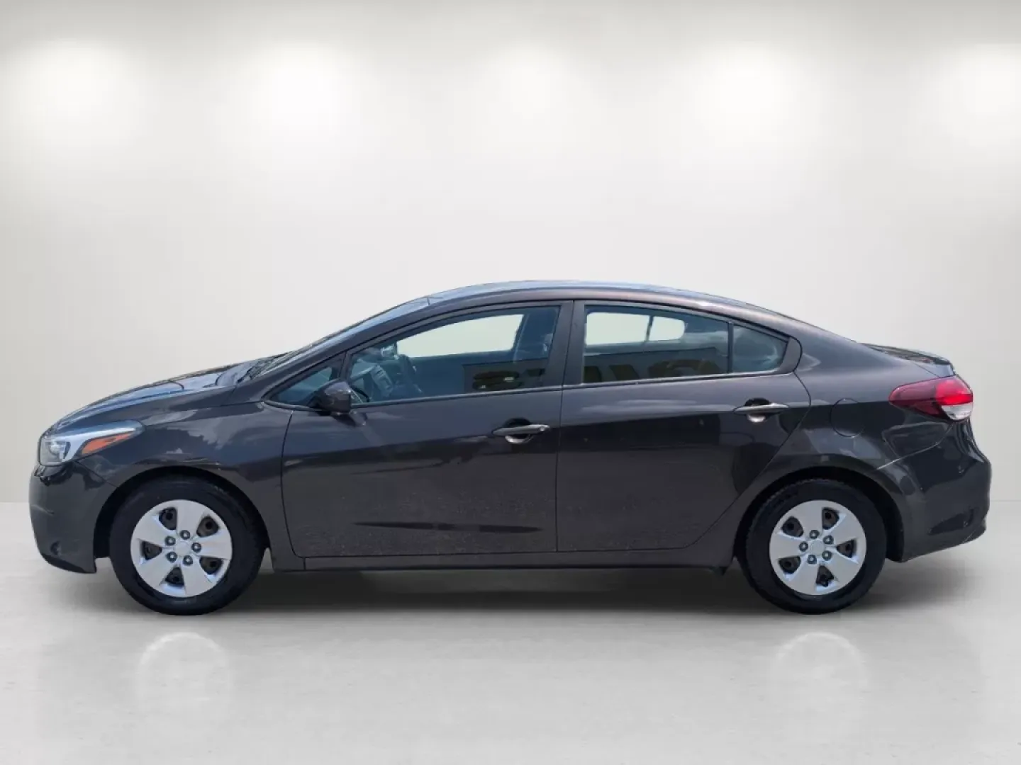 2018 /Black Kia Forte LX (3KPFK4A7XJE) with an Other engine, located at 804 22nd Ave, Phenix City, AL, 36870, (334) 297-1860, 32.484749, -85.024475 - Are you on the hunt for a reliable vehicle that perfectly balances comfort, style, and affordability? Look no further than this stunning 2018 Kia Forte LX, available now at Gils Auto in Phenix City, Alabama. Whether you're commuting to work, running errands, or planning a weekend getaway, this sedan - Photo#7