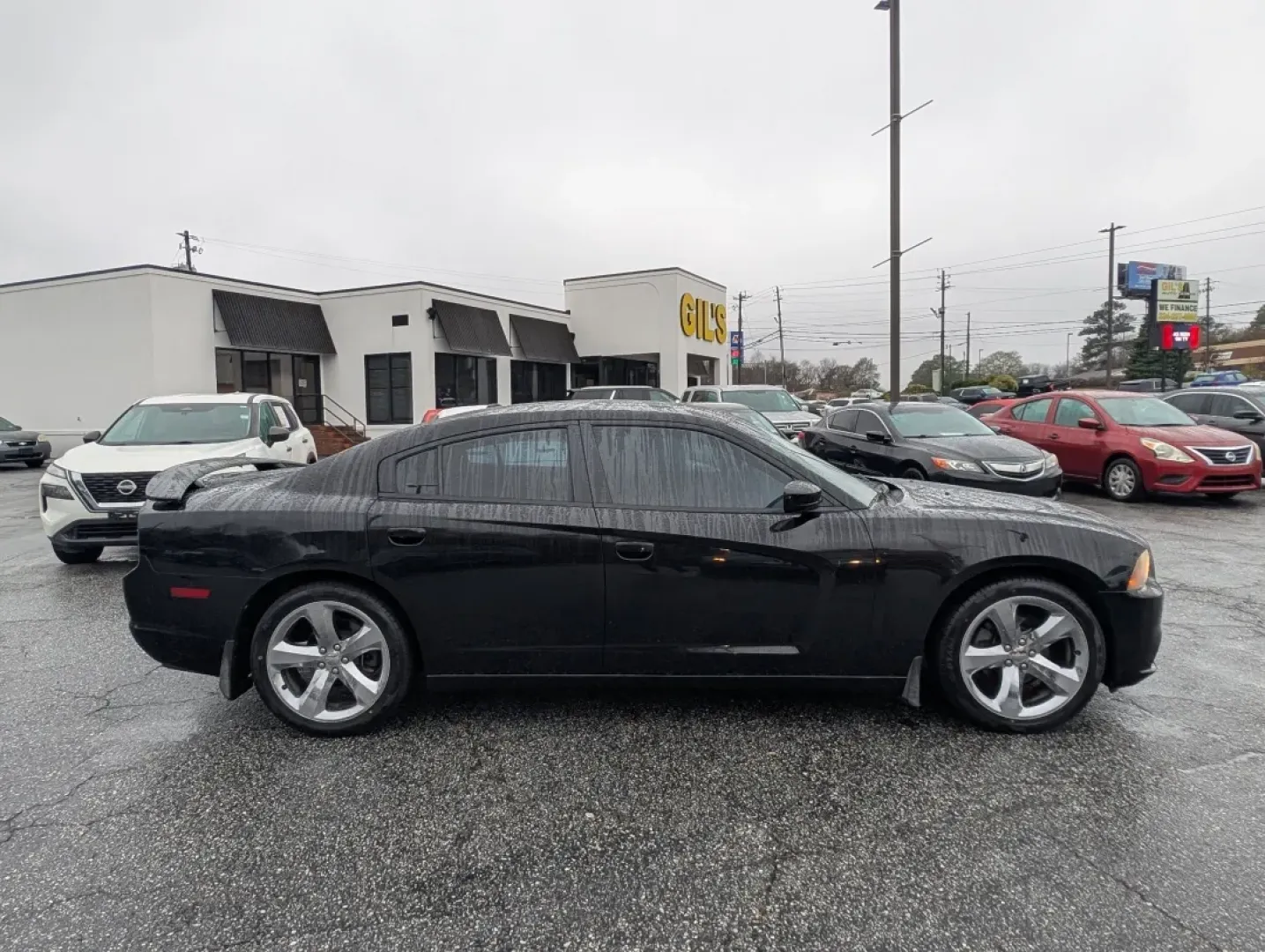 2013 /Black/Red Interior Dodge Charger SXT Plus (2C3CDXHG9DH) with an Other engine, located at 804 22nd Ave, Phenix City, AL, 36870, (334) 297-1860, 32.484749, -85.024475 - Elevate your driving experience with the 2013 Dodge Charger SXT Plus, the perfect vehicle for those who crave style, performance, and comfort. Whether you're navigating the bustling streets of downtown Phenix City or planning a weekend getaway to Lake Eufaula, this sporty coupe combines power and so - Photo#3