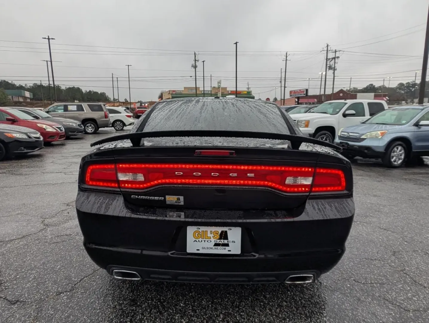 2013 /Black/Red Interior Dodge Charger SXT Plus (2C3CDXHG9DH) with an Other engine, located at 804 22nd Ave, Phenix City, AL, 36870, (334) 297-1860, 32.484749, -85.024475 - Elevate your driving experience with the 2013 Dodge Charger SXT Plus, the perfect vehicle for those who crave style, performance, and comfort. Whether you're navigating the bustling streets of downtown Phenix City or planning a weekend getaway to Lake Eufaula, this sporty coupe combines power and so - Photo#5
