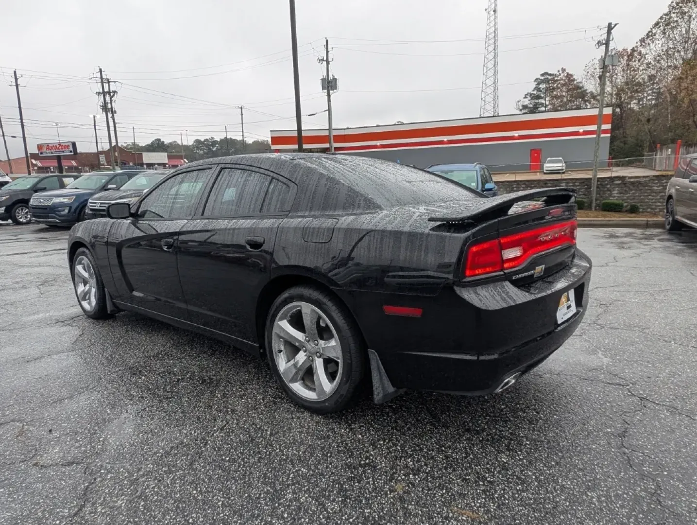 2013 /Black/Red Interior Dodge Charger SXT Plus (2C3CDXHG9DH) with an Other engine, located at 804 22nd Ave, Phenix City, AL, 36870, (334) 297-1860, 32.484749, -85.024475 - Elevate your driving experience with the 2013 Dodge Charger SXT Plus, the perfect vehicle for those who crave style, performance, and comfort. Whether you're navigating the bustling streets of downtown Phenix City or planning a weekend getaway to Lake Eufaula, this sporty coupe combines power and so - Photo#6