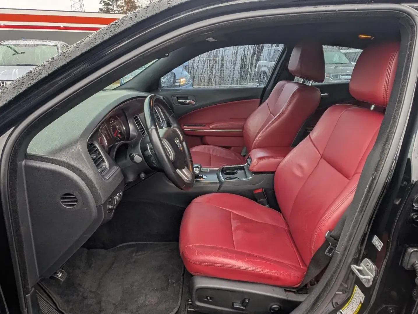 2013 /Black/Red Interior Dodge Charger SXT Plus (2C3CDXHG9DH) with an Other engine, located at 804 22nd Ave, Phenix City, AL, 36870, (334) 297-1860, 32.484749, -85.024475 - Elevate your driving experience with the 2013 Dodge Charger SXT Plus, the perfect vehicle for those who crave style, performance, and comfort. Whether you're navigating the bustling streets of downtown Phenix City or planning a weekend getaway to Lake Eufaula, this sporty coupe combines power and so - Photo#9