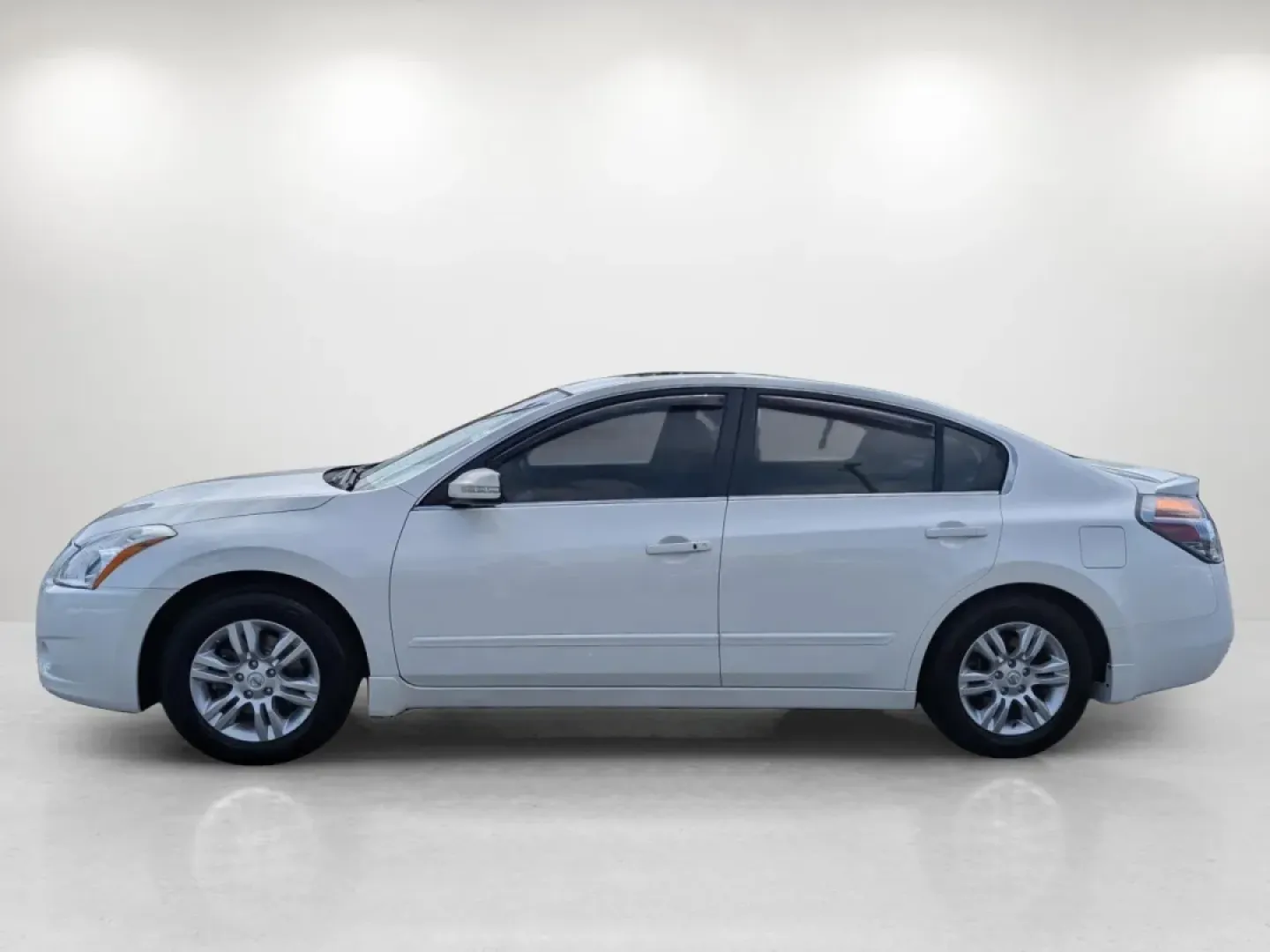 2012 /Blonde Nissan Altima 2.5 SL (1N4AL2APXCC) with an Other engine, located at 804 22nd Ave, Phenix City, AL, 36870, (334) 297-1860, 32.484749, -85.024475 - **Discover Comfort and Style with the 2012 Nissan Altima at Gils Auto!**<br /> <br /> Looking for a reliable vehicle that perfectly balances comfort, style, and practicality? The 2012 Nissan Altima is ideal for long commutes and weekend getaways alike! This sleek sedan combines a smooth ride with im - Photo#7