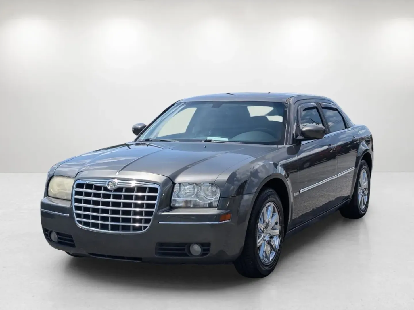 2009 /Dark slate gray Chrysler 300 Touring (2C3KA53V69H) with an Other engine, located at 1430 Gateway Drive, Opelika, AL, 36801, (334) 239-0944, 32.637871, -85.409790 - Welcome to a new chapter in your driving experience! Whether you're navigating the bustling streets of Phenix City or embarking on a weekend getaway, the 2009 Chrysler 300 Touring is the perfect vehicle for those seeking a blend of comfort, style, and reliability. With its deep Dark Titanium Metalli - Photo#0