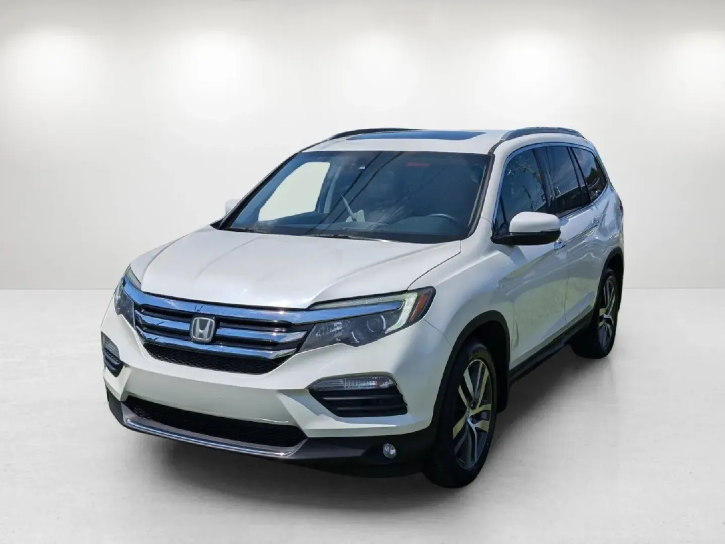 2016 Honda Pilot Elite (5FNYF6H07GB) with an Other engine, located at 3959 U.S. 80 W, Phenix City, AL, 36870, (334) 297-4885, 32.469296, -85.135185 - **Adventure Awaits with the 2016 Honda Pilot Elite - Perfect for Family Road Trips!**<br /> <br /> If you're searching for a reliable vehicle that combines comfort, style, and capability, look no further than the 2016 Honda Pilot Elite. This versatile SUV is designed for growing families and weekend - Photo#1