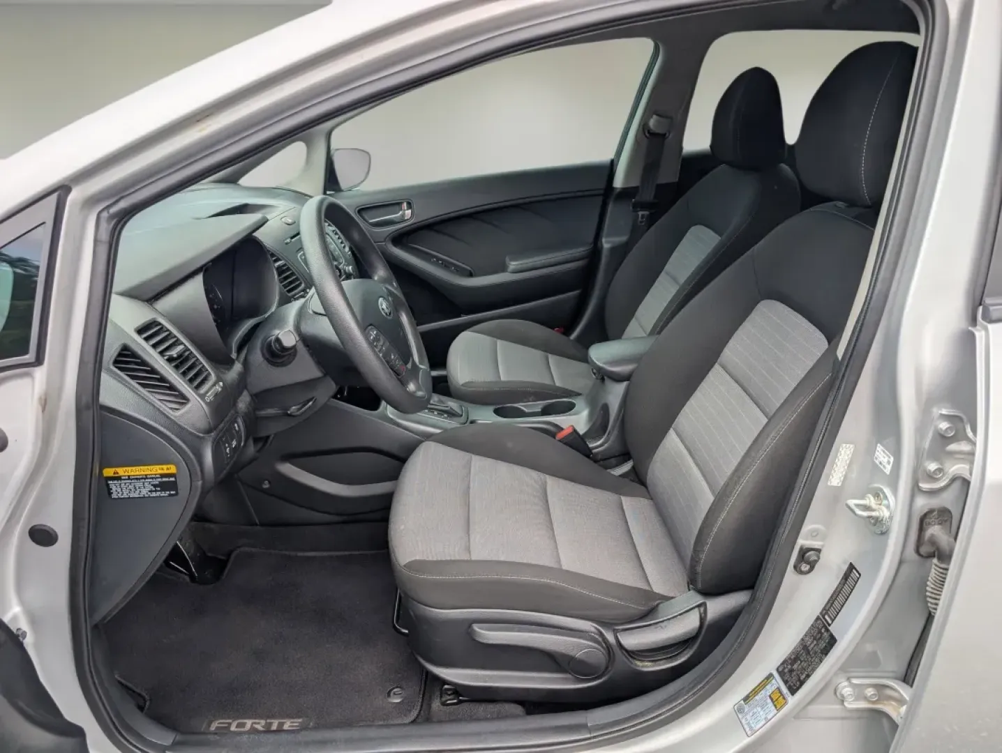 2016 /Black Kia Forte 5-Door LX (KNAFK5A80G5) with an Other engine, located at 5115 14th Ave., Columbus, GA, 31904, (706) 323-0345, 32.511494, -84.971046 - Are you ready to elevate your daily drives and discover a vehicle that perfectly balances style, comfort, and practicality? Look no further than this 2016 Kia Forte 5-Door LX, a fantastic choice for budget-conscious buyers and those seeking reliable transportation. With its sleek Silky Silver exteri - Photo#9