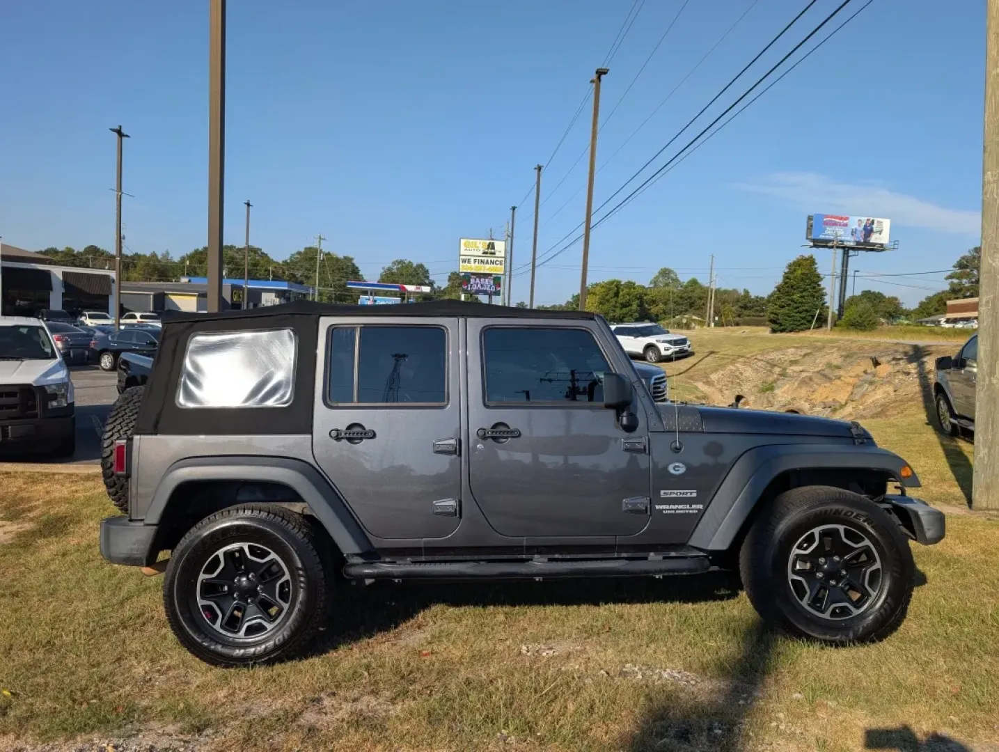 2017 /Black Jeep Wrangler Sport (1C4BJWDG5HL) with an Other engine, located at 804 22nd Ave, Phenix City, AL, 36870, (334) 297-1860, 32.484749, -85.024475 - **Adventure Awaits: 2017 Jeep Wrangler Sport in Phenix City, AL**<br /> <br /> Are you ready to take on the open road and explore the great outdoors? The 2017 Jeep Wrangler Sport is not just a vehicle; it's a lifestyle. Built for adventure, this rugged SUV is perfect for weekend escapades, off-road - Photo#3