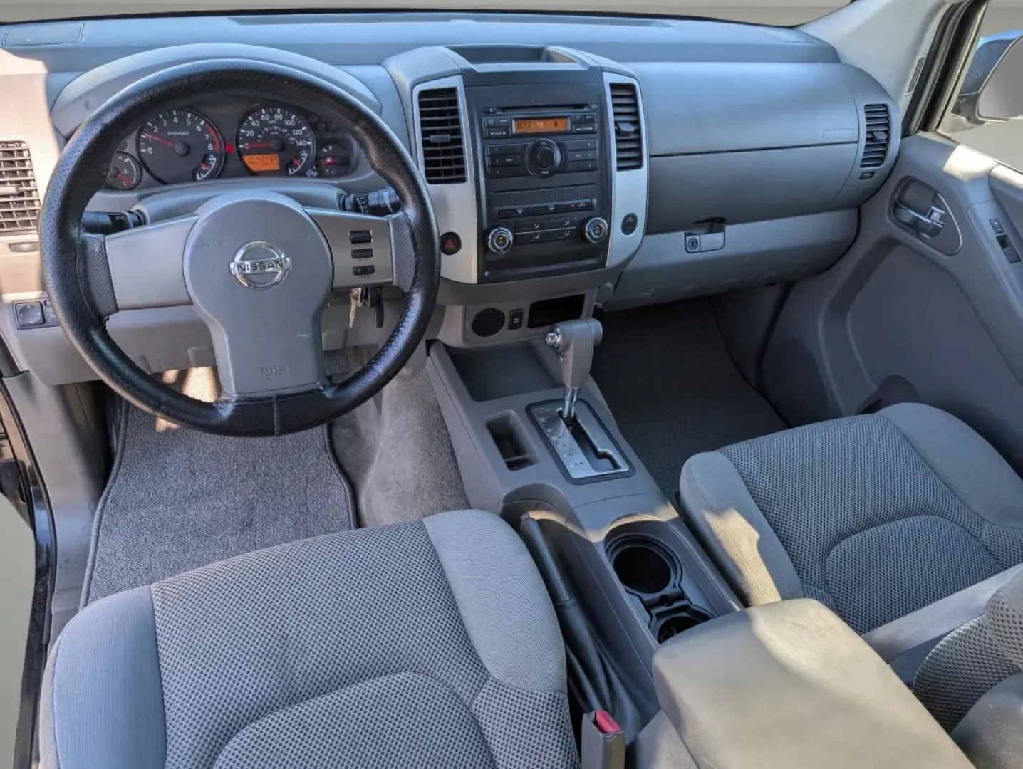 2010 /Steel Nissan Frontier SE (1N6AD0FR2AC) with an Other engine, located at 1430 Gateway Drive, Opelika, AL, 36801, (334) 239-0944, 32.637871, -85.409790 - **Discover Adventure with the 2010 Nissan Frontier SE at Gils Auto - Phenix City!**<br /> <br /> Are you ready to embrace the thrill of weekend adventures or tackle everyday tasks with ease? Whether you're hauling gear for a family camping trip or navigating city streets, the 2010 Nissan Frontier SE - Photo#12