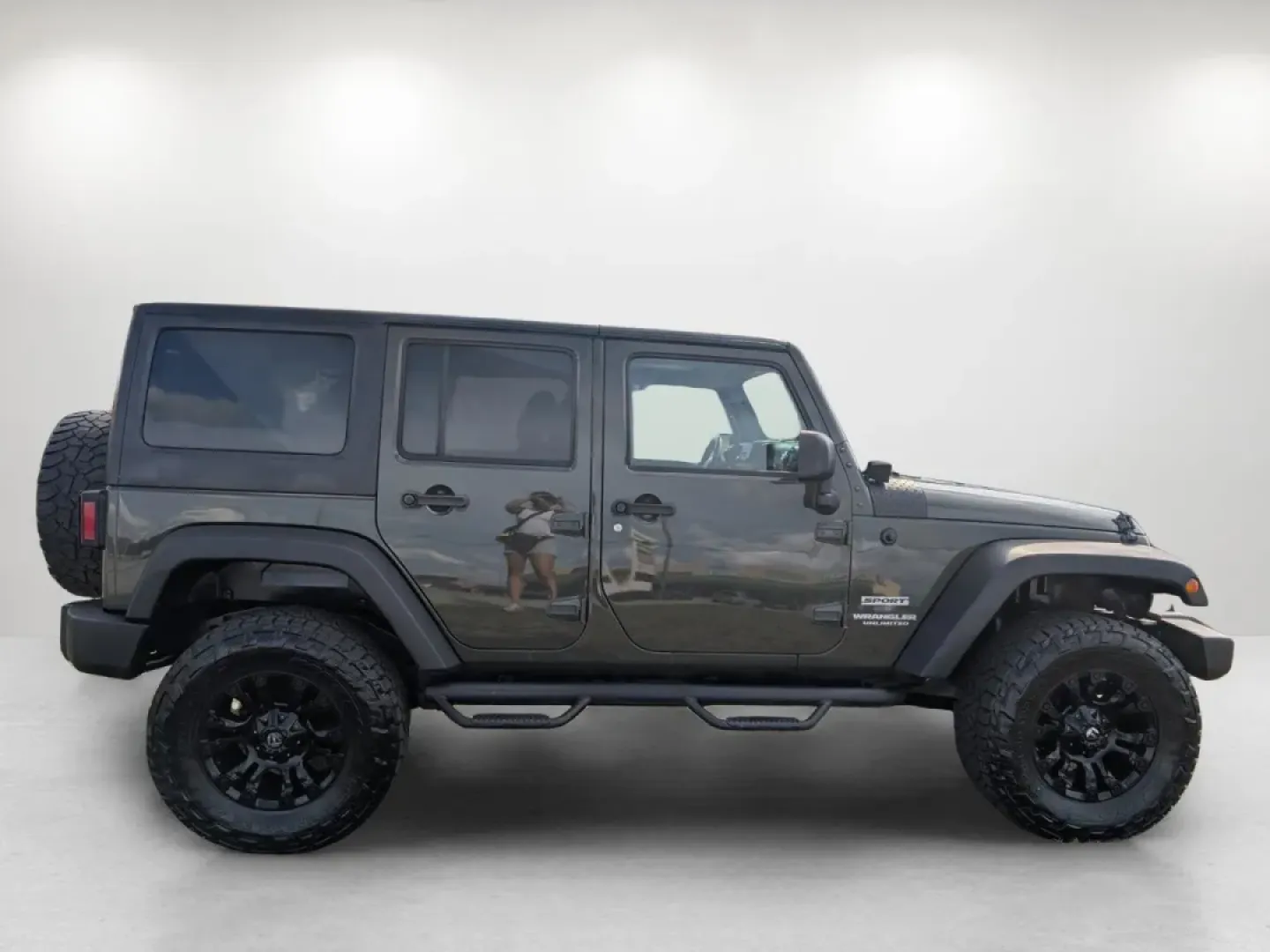 2015 /Black Jeep Wrangler Sport (1C4BJWDG4FL) with an Other engine, located at 1430 Gateway Drive, Opelika, AL, 36801, (334) 239-0944, 32.637871, -85.409790 - **Adventure Awaits with the 2015 Jeep Wrangler at Gils Auto - Phenix City!**<br /> <br /> Are you ready to take on the great outdoors, cruise through city streets, or embark on a family road trip? The 2015 Jeep Wrangler Sport is your ultimate companion for adventure, designed to handle any terrain w - Photo#3