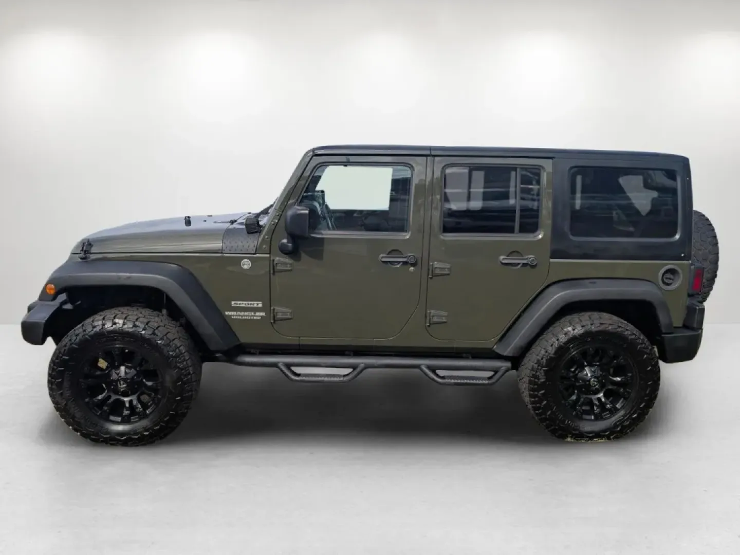 2015 /Black Jeep Wrangler Sport (1C4BJWDG4FL) with an Other engine, located at 1430 Gateway Drive, Opelika, AL, 36801, (334) 239-0944, 32.637871, -85.409790 - **Adventure Awaits with the 2015 Jeep Wrangler at Gils Auto - Phenix City!**<br /> <br /> Are you ready to take on the great outdoors, cruise through city streets, or embark on a family road trip? The 2015 Jeep Wrangler Sport is your ultimate companion for adventure, designed to handle any terrain w - Photo#7