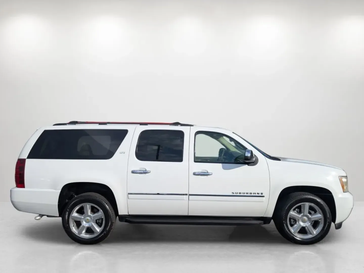2009 /Light Cashmere/Dark Cashemere Chevrolet Suburban LTZ (1GNFC36029R) with an Other engine, located at 1430 Gateway Drive, Opelika, AL, 36801, (334) 239-0944, 32.637871, -85.409790 - **Explore the Open Road with the 2009 Chevrolet Suburban LTZ at Gils Auto Phenix City, AL!**<br /> <br /> Are you ready to elevate your driving experience and make family trips or weekend adventures unforgettable? Look no further than the 2009 Chevrolet Suburban LTZ, now available at Gils Auto, you - Photo#3