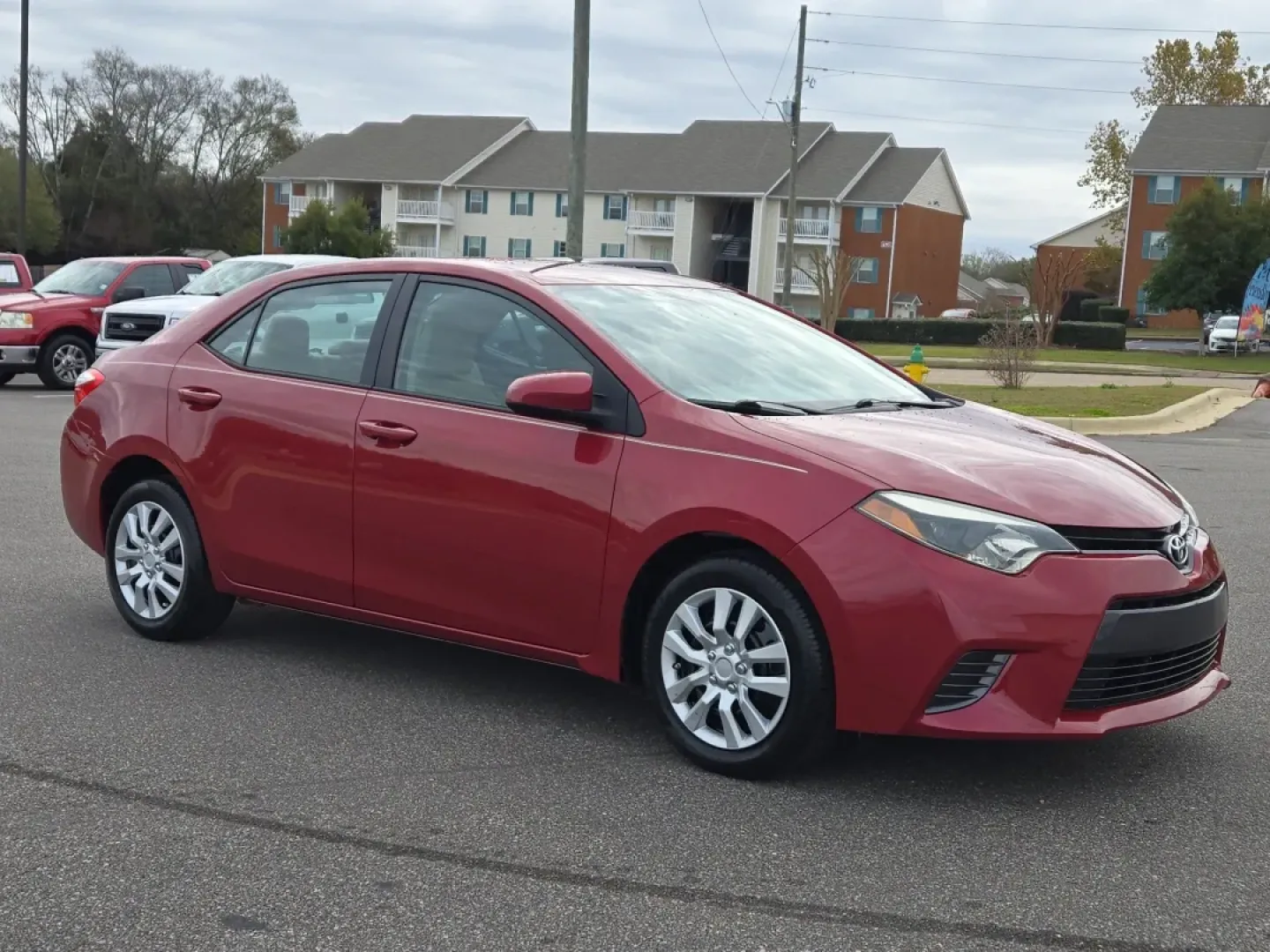 2015 Toyota Corolla (5YFBURHE5FP) with an Other engine, located at 521 Old Farm Lane Rd, Prattville, AL, 36066, (334) 325-1505, 32.482460, -86.416367 - Ready to elevate your daily drive? Look no further than this stunning 2015 Toyota Corolla, available now at Gils Auto in Prattville, AL. With its sleek red exterior and reliable performance, this sedan is not just a vehicle; it's a lifestyle choice for those who appreciate reliability, efficiency, a - Photo#3