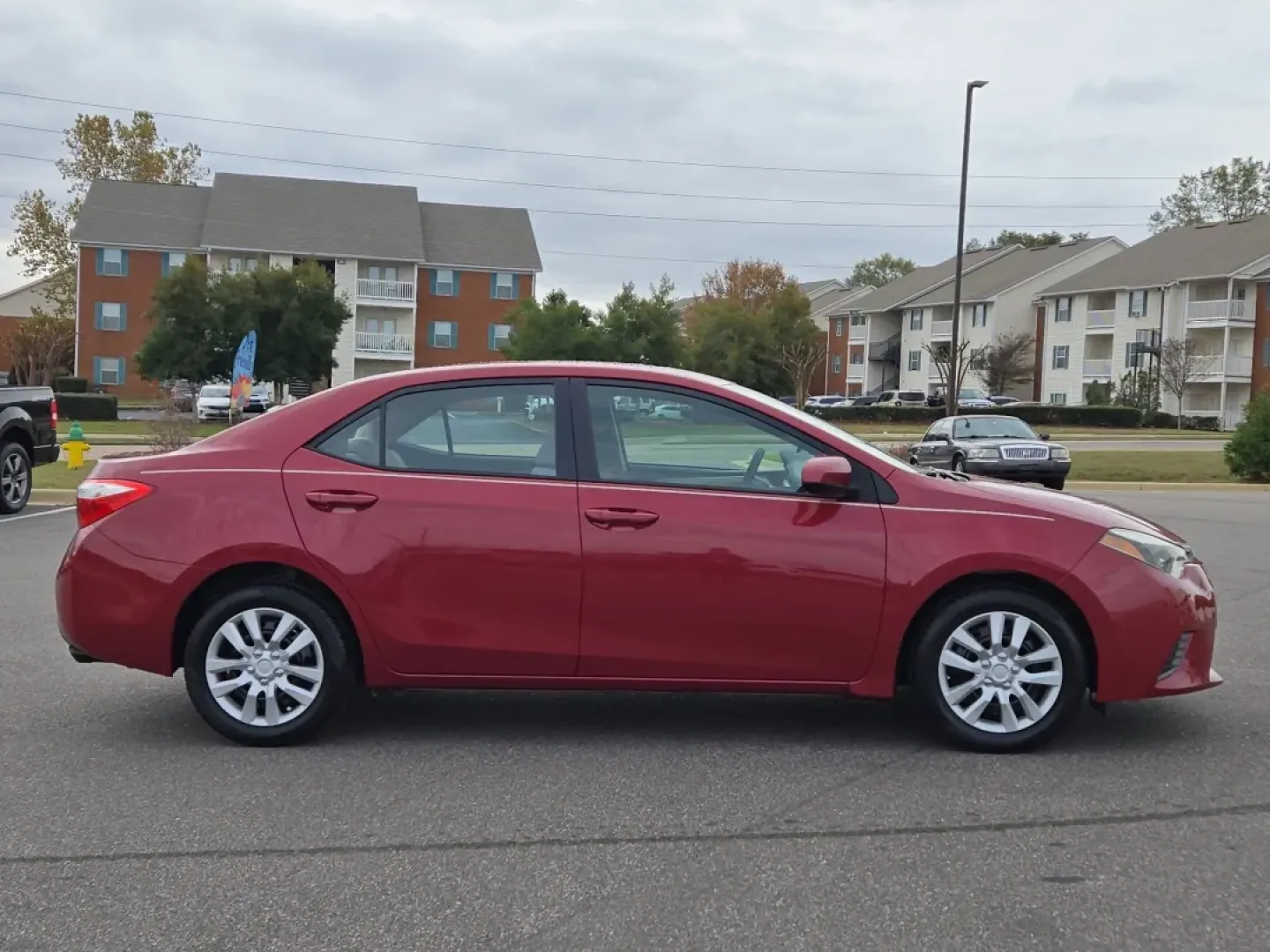 2015 Toyota Corolla (5YFBURHE5FP) with an Other engine, located at 521 Old Farm Lane Rd, Prattville, AL, 36066, (334) 325-1505, 32.482460, -86.416367 - Ready to elevate your daily drive? Look no further than this stunning 2015 Toyota Corolla, available now at Gils Auto in Prattville, AL. With its sleek red exterior and reliable performance, this sedan is not just a vehicle; it's a lifestyle choice for those who appreciate reliability, efficiency, a - Photo#4
